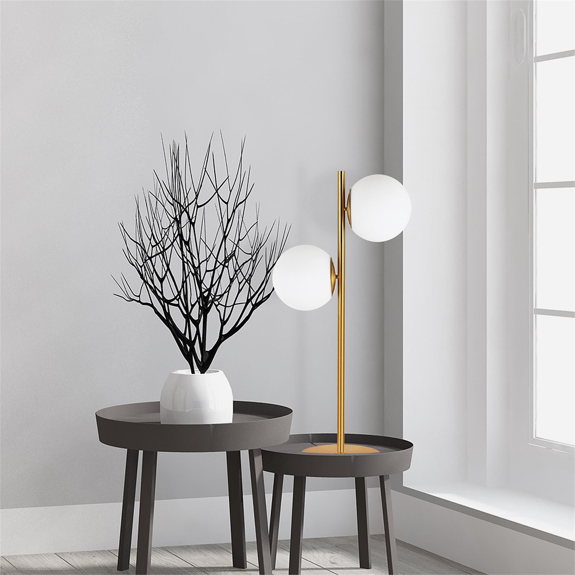 Shown in Aged Brass and White finish and Opal White Globe glass