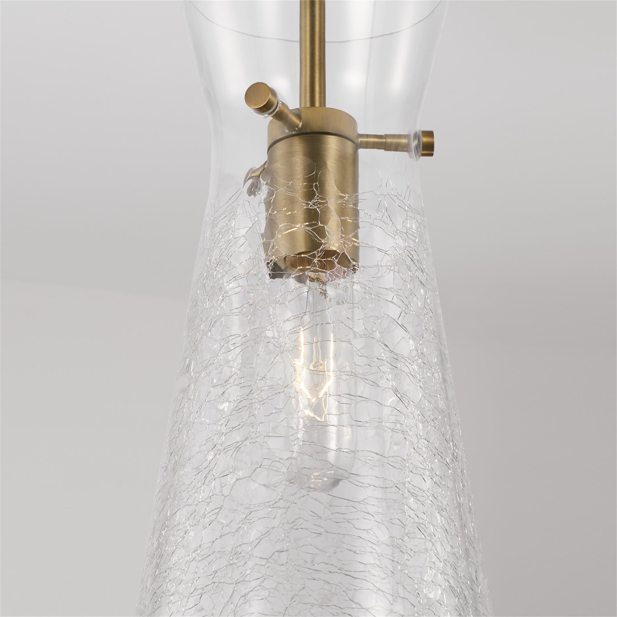 Shown in Aged Brass finish and Clear Half-Crackle glass