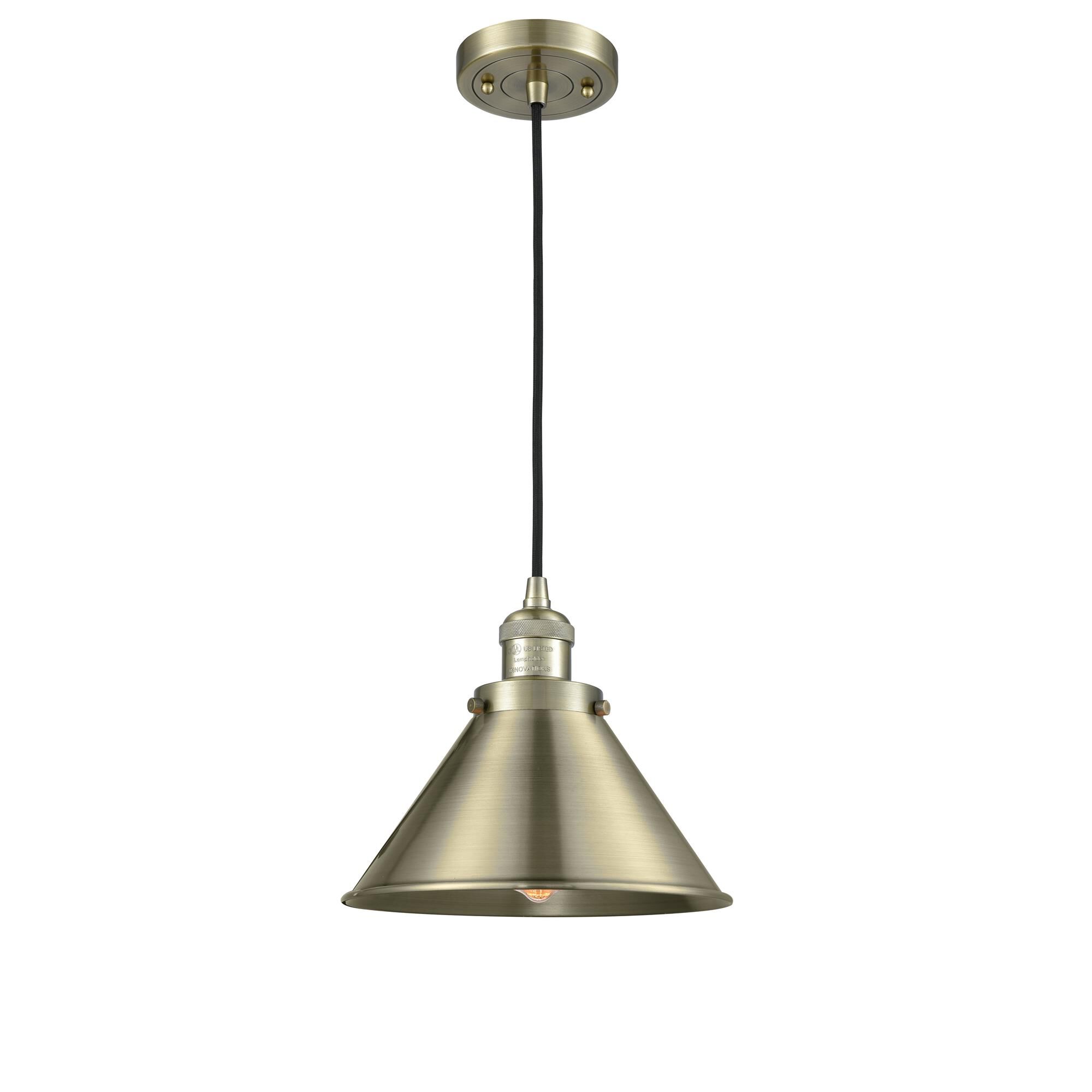 Shown in Antique Brass finish and Antique Brass shade