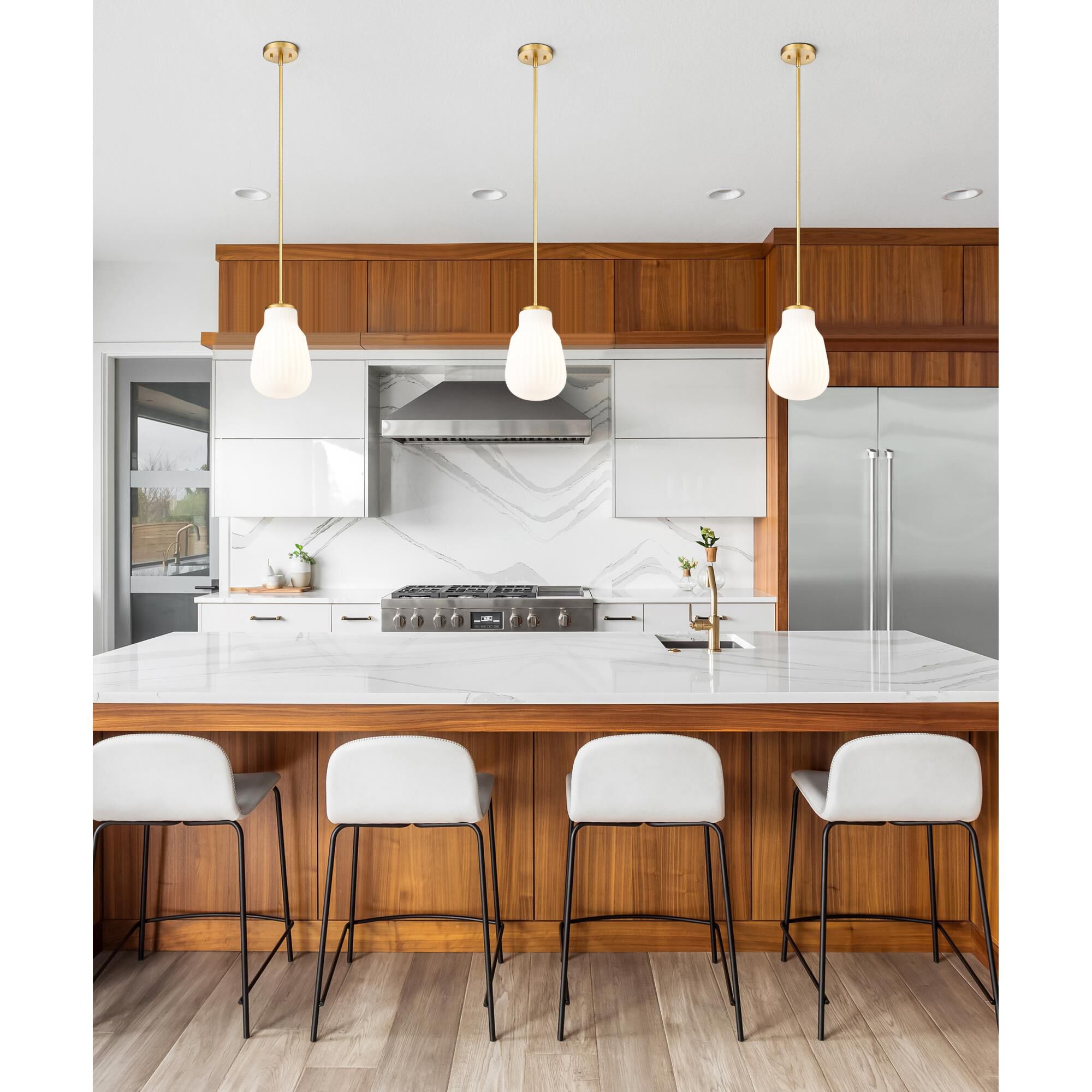 Shown in Modern Gold finish and White Opal glass and White Opal shade