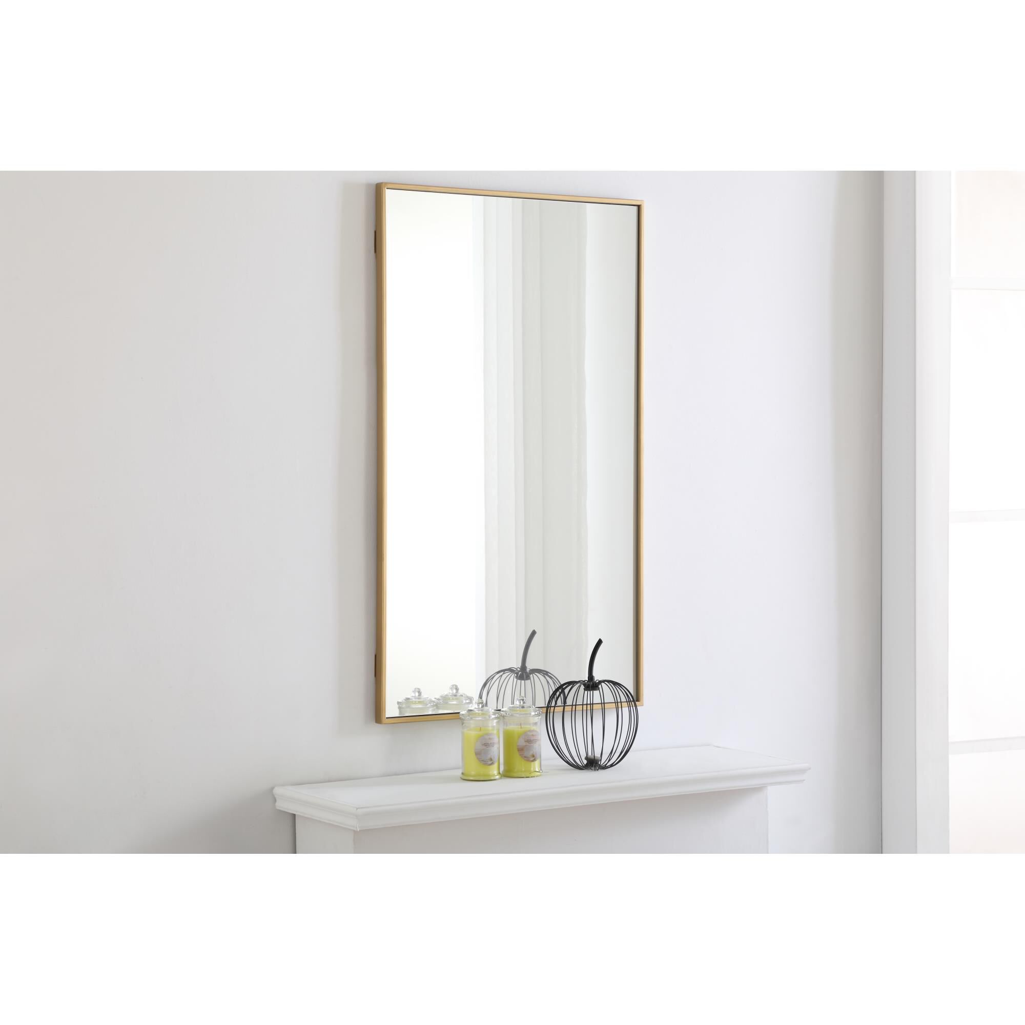 Shown in Brass finish and Clear Mirror Beveled glass