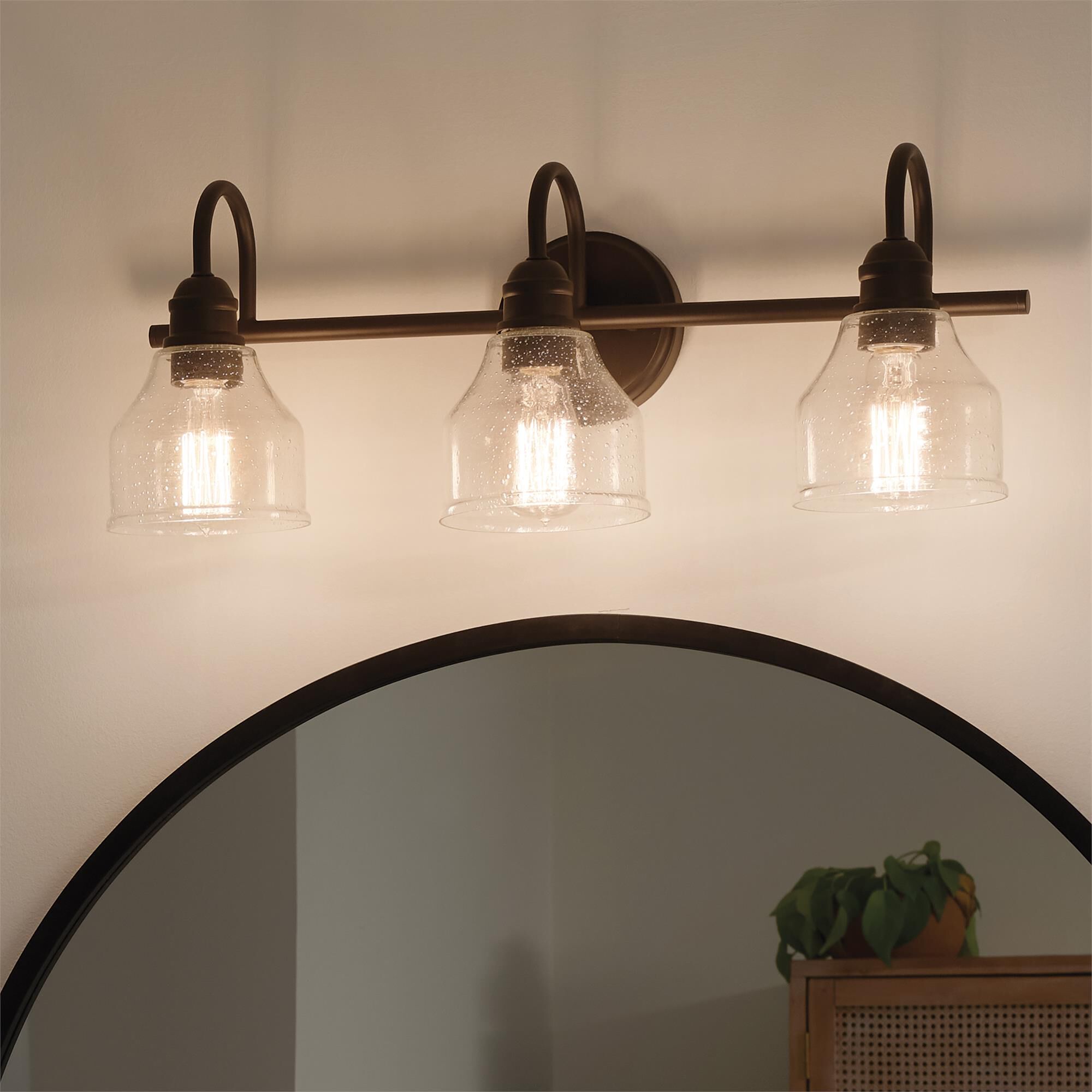 Shown in Olde Bronze finish and Clear Seeded glass