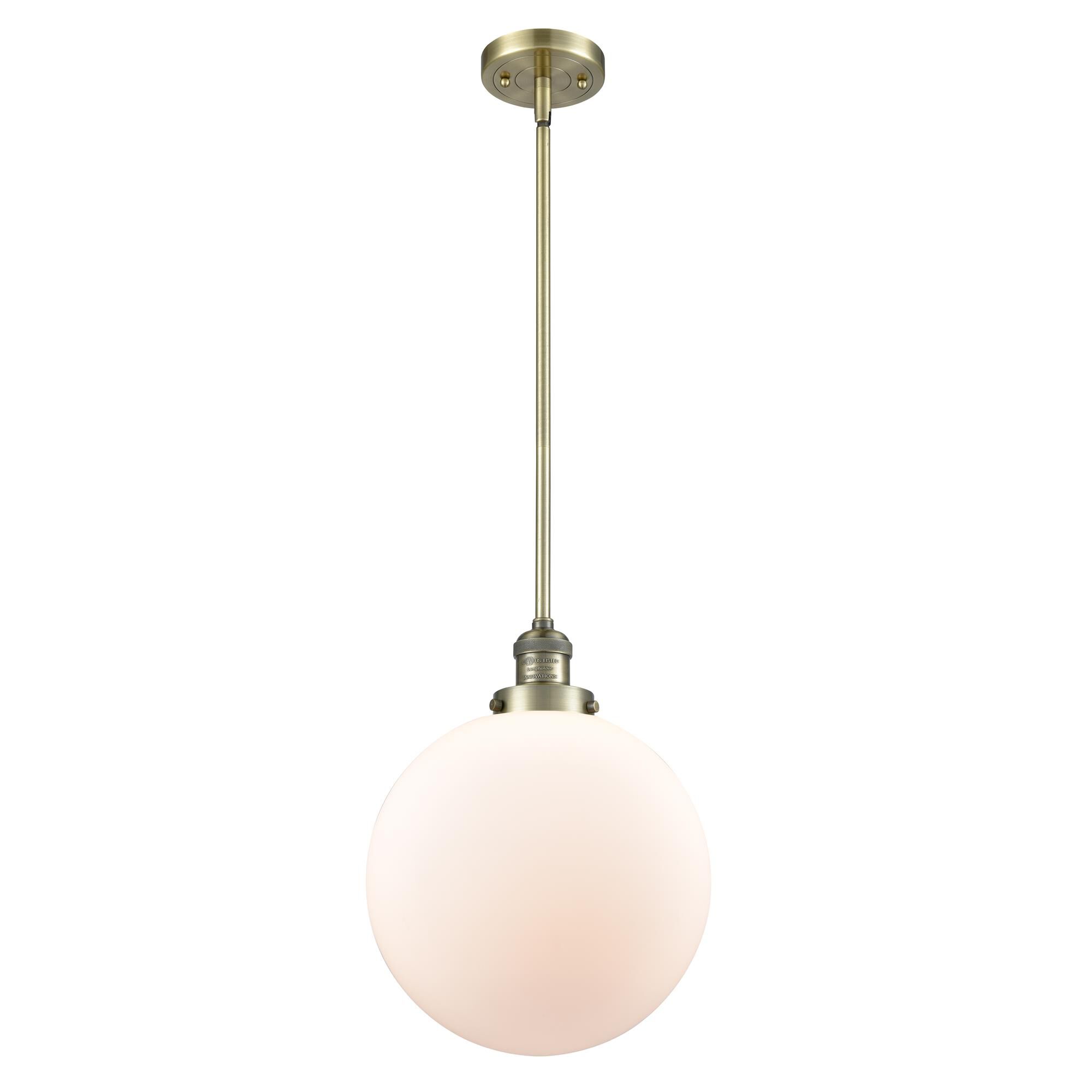 Shown in Antique Brass finish and Matte White Cased Beacon glass