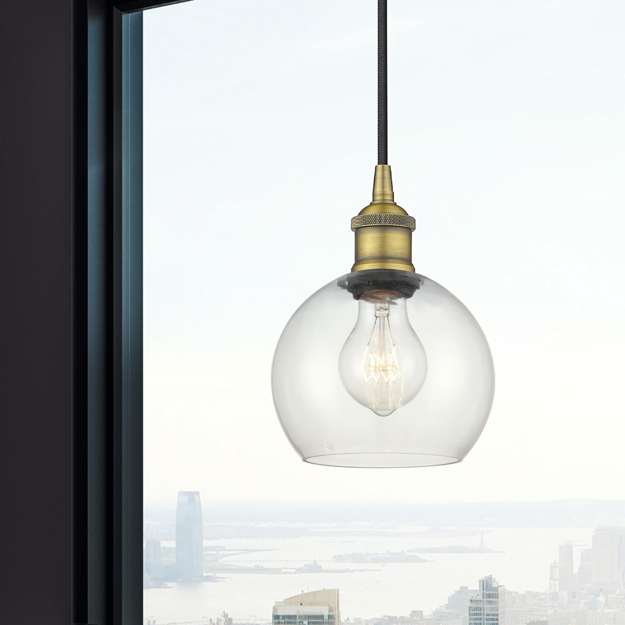 Shown in Brushed Brass finish and Clear glass