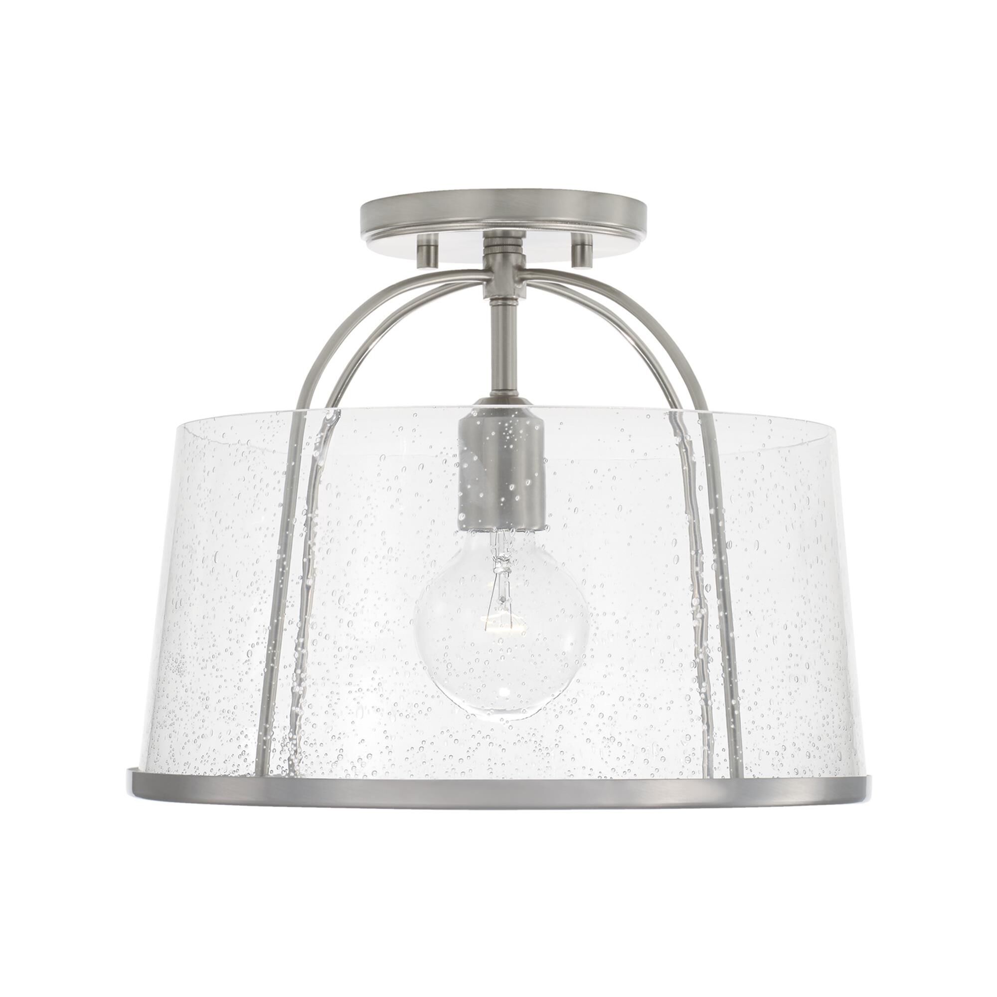 Shown in Brushed Nickel finish and Clear Seeded glass