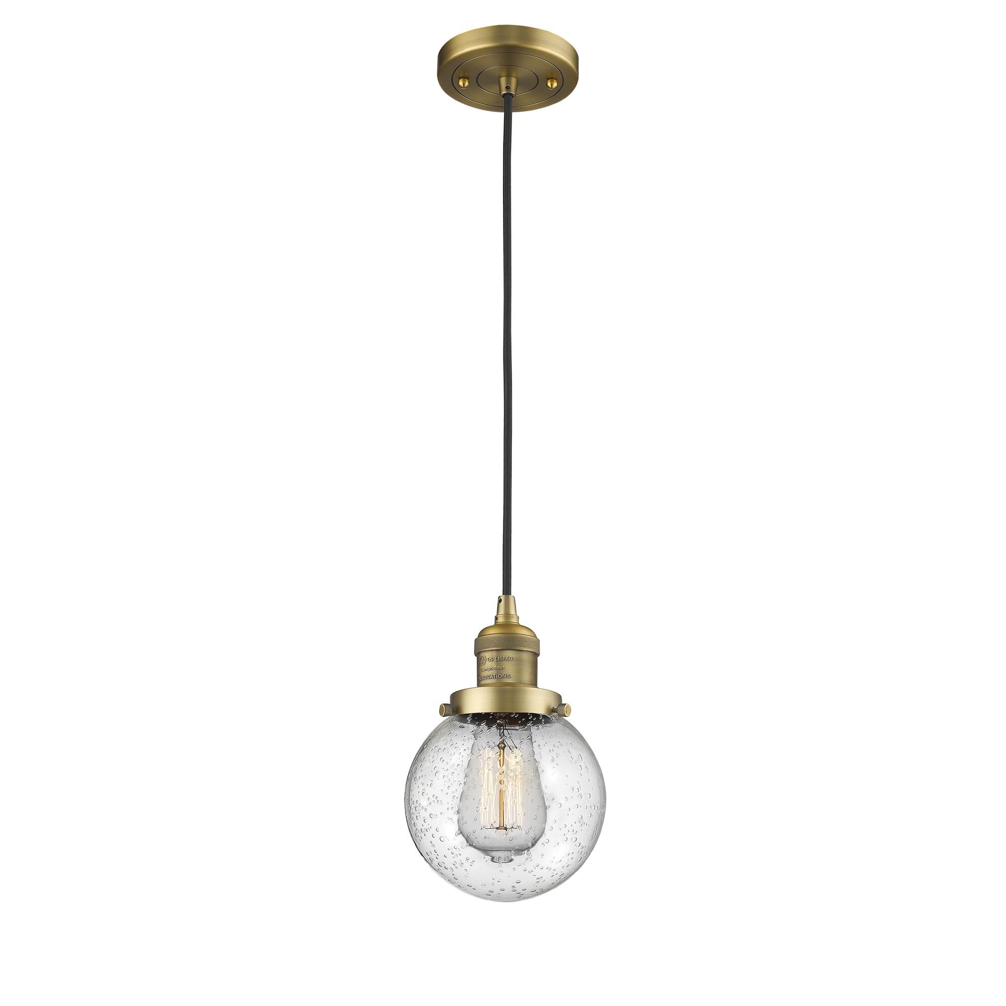 Shown in Brushed Brass finish and Seedy glass