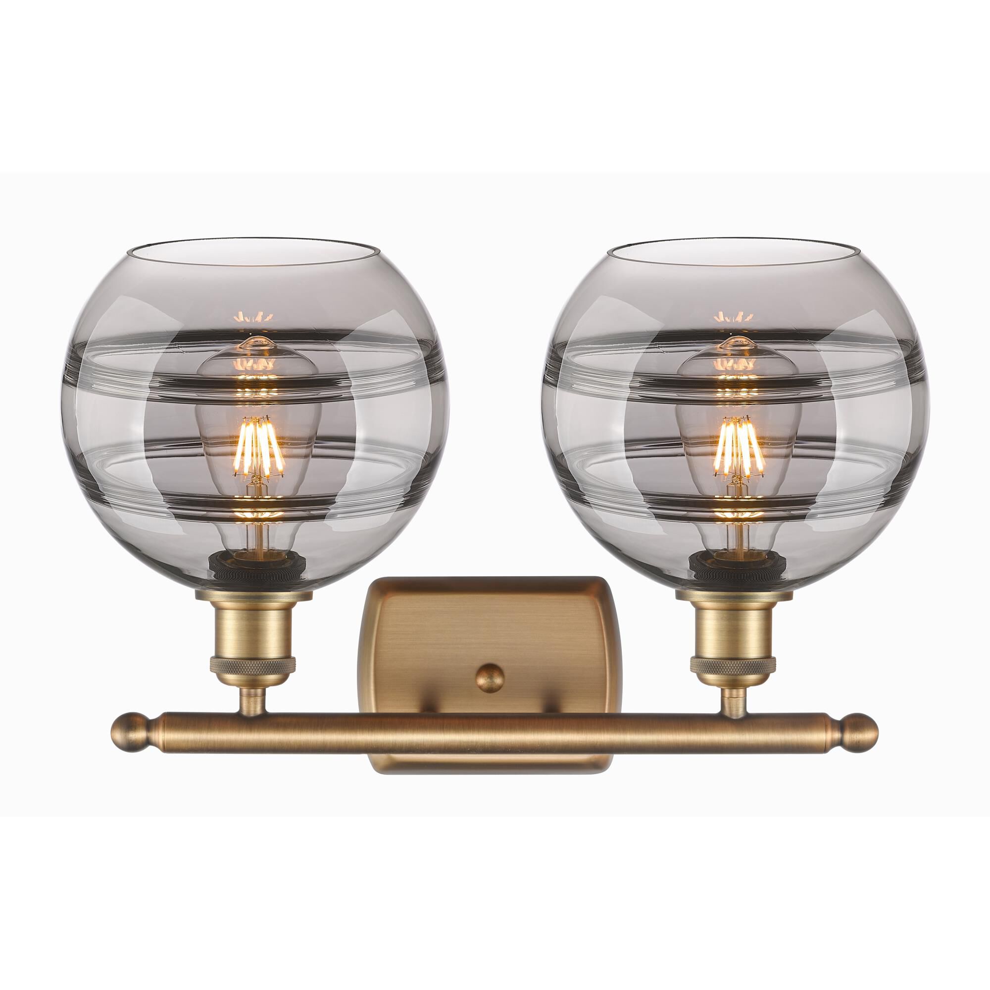 Shown in Brushed Brass finish and Light Smoke glass