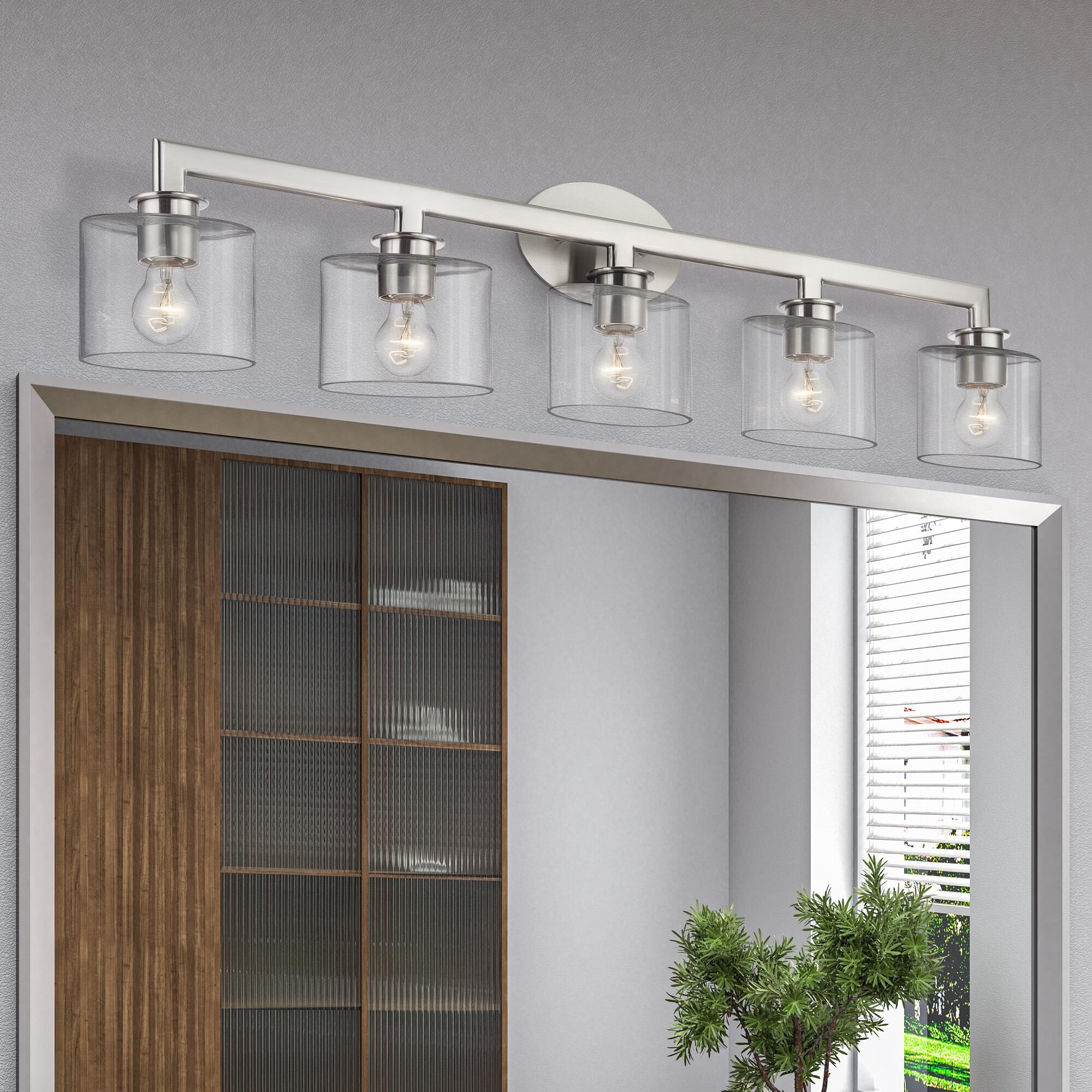 Shown in Brushed Nickel finish and Mouth Blown Clear glass