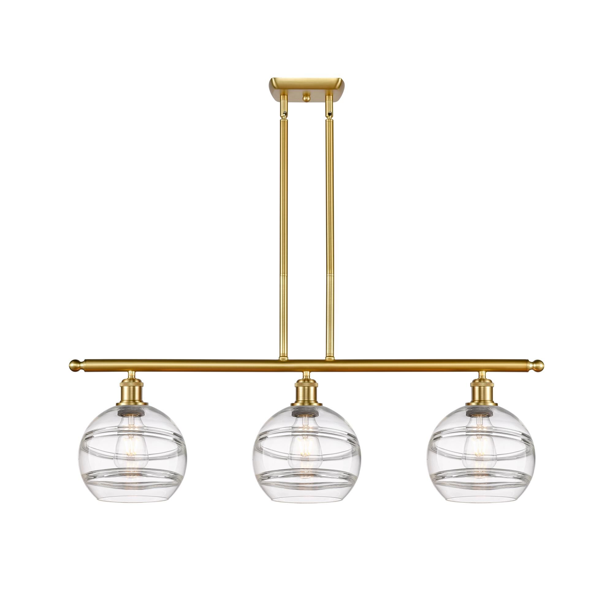 Shown in Satin Gold finish and Clear glass