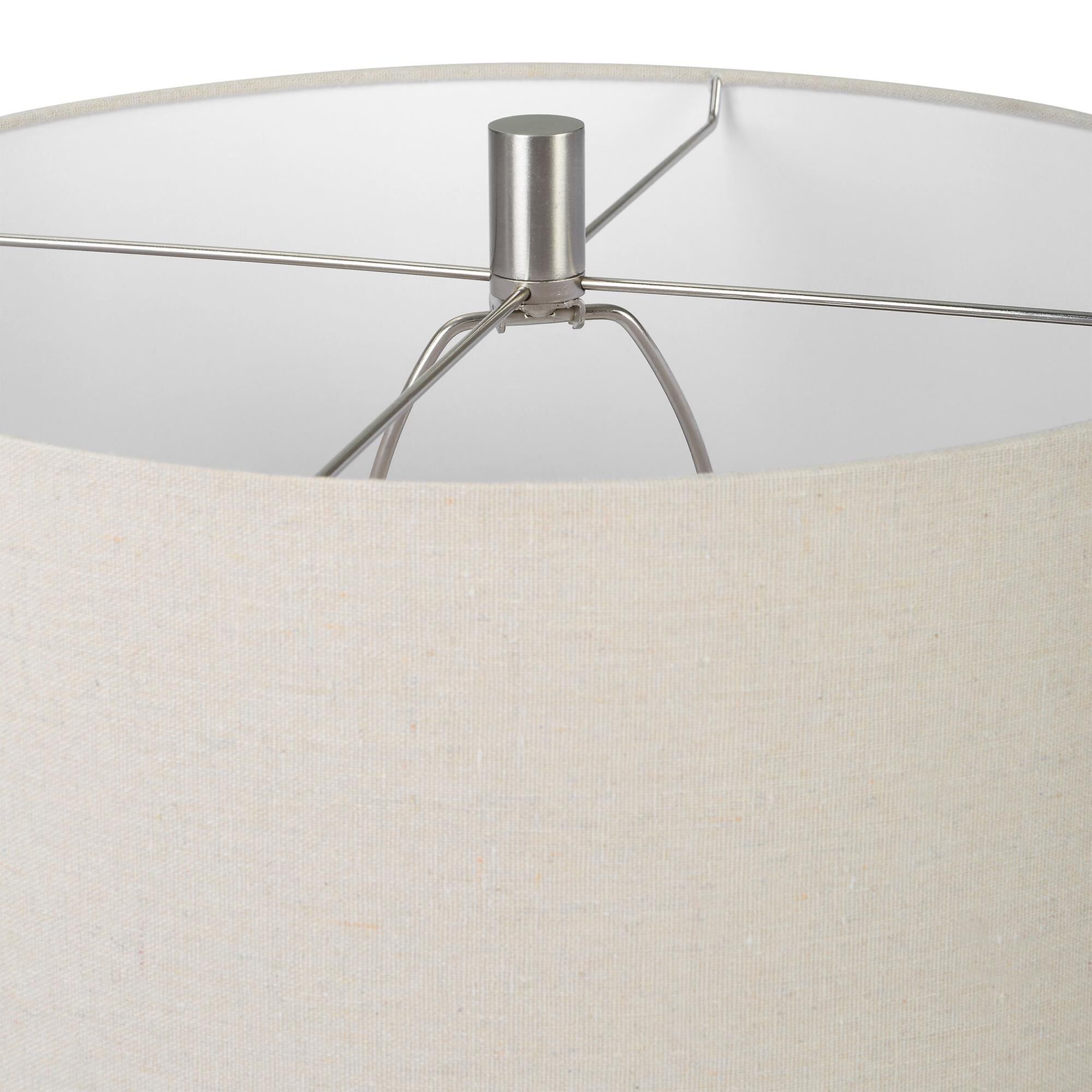 Shown in This Ceramic Table Lamp Has A Unique Shape Featuring A Traditional Style Urn Body That Has Cut Edges finish and Round Hardback Drum shade