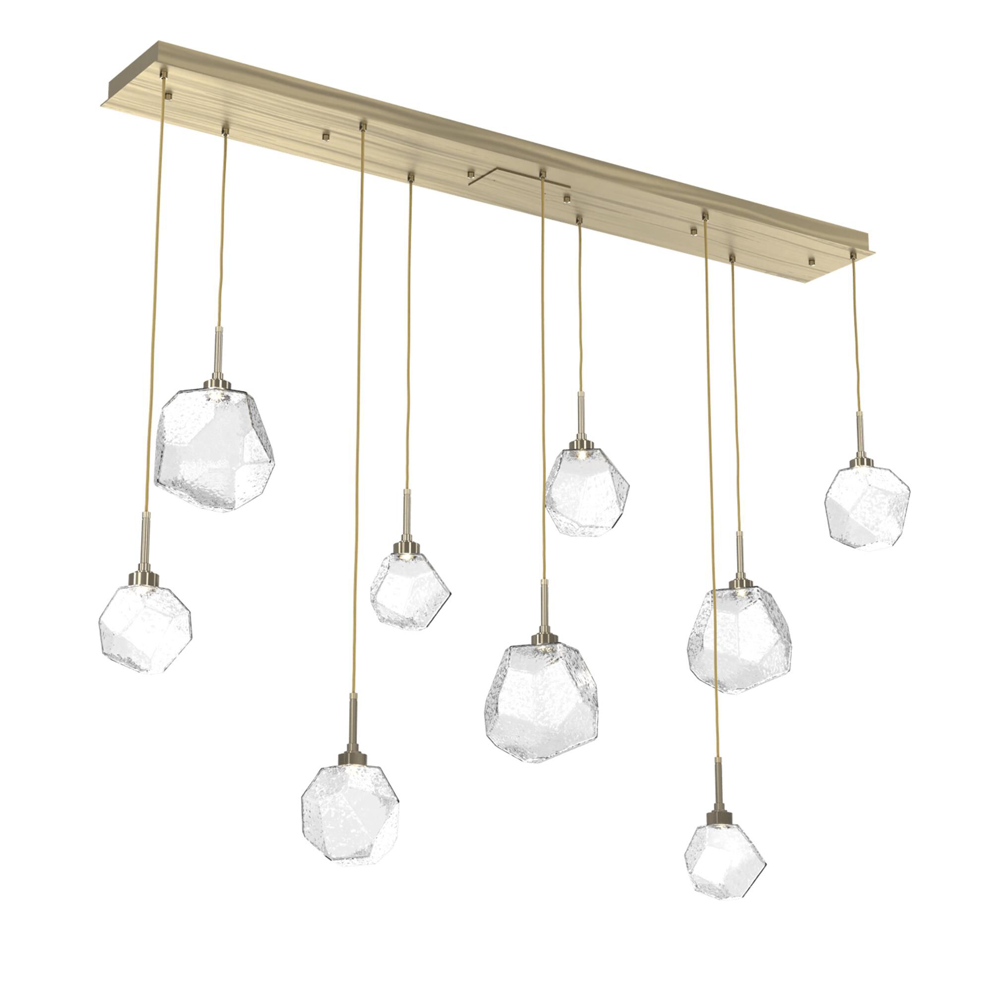 Shown in Novel Brass finish and Clear glass