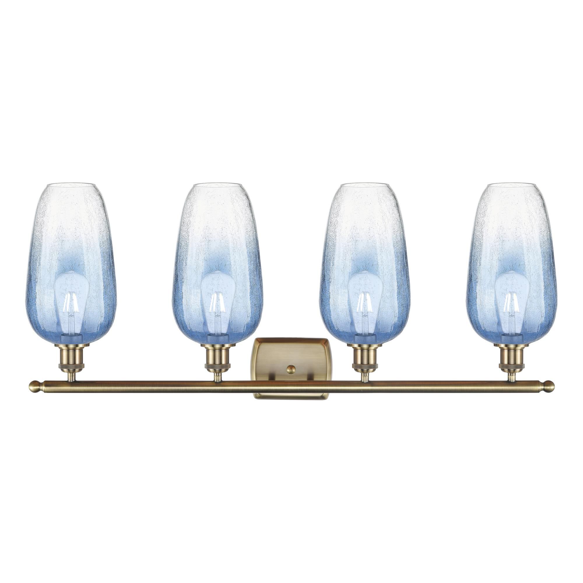Shown in Antique Brass finish and Sapphire Blue glass