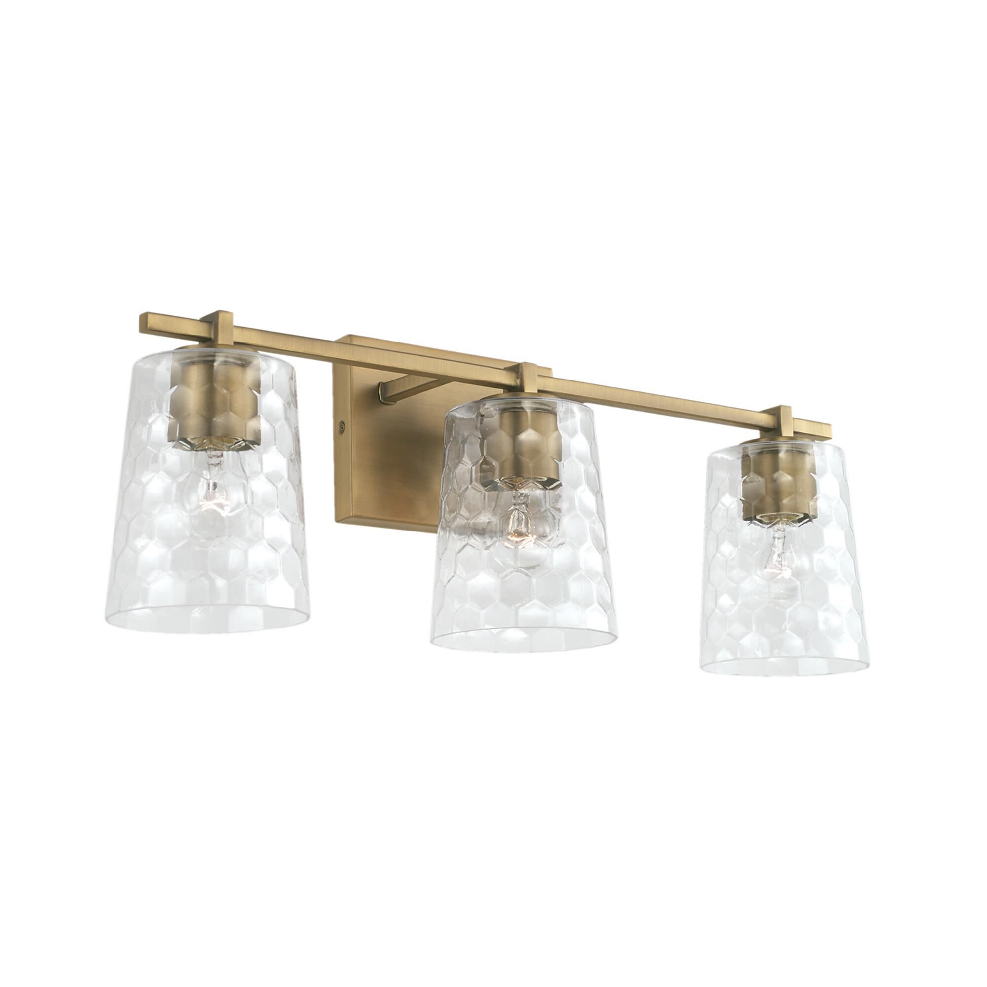 Shown in Aged Brass finish and Clear Honeycomb glass