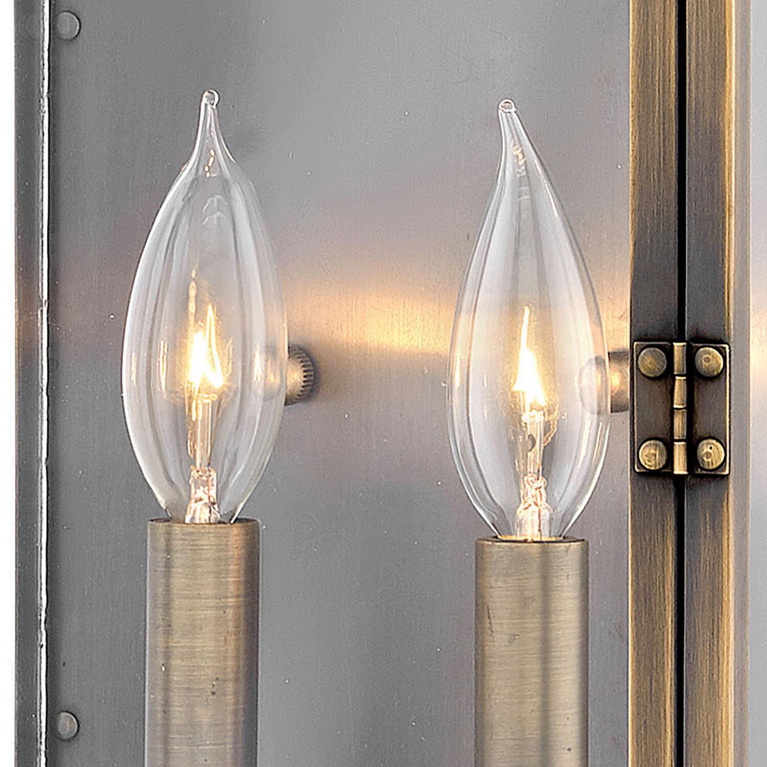 Shown in Dark Antique Brass finish and Clear glass