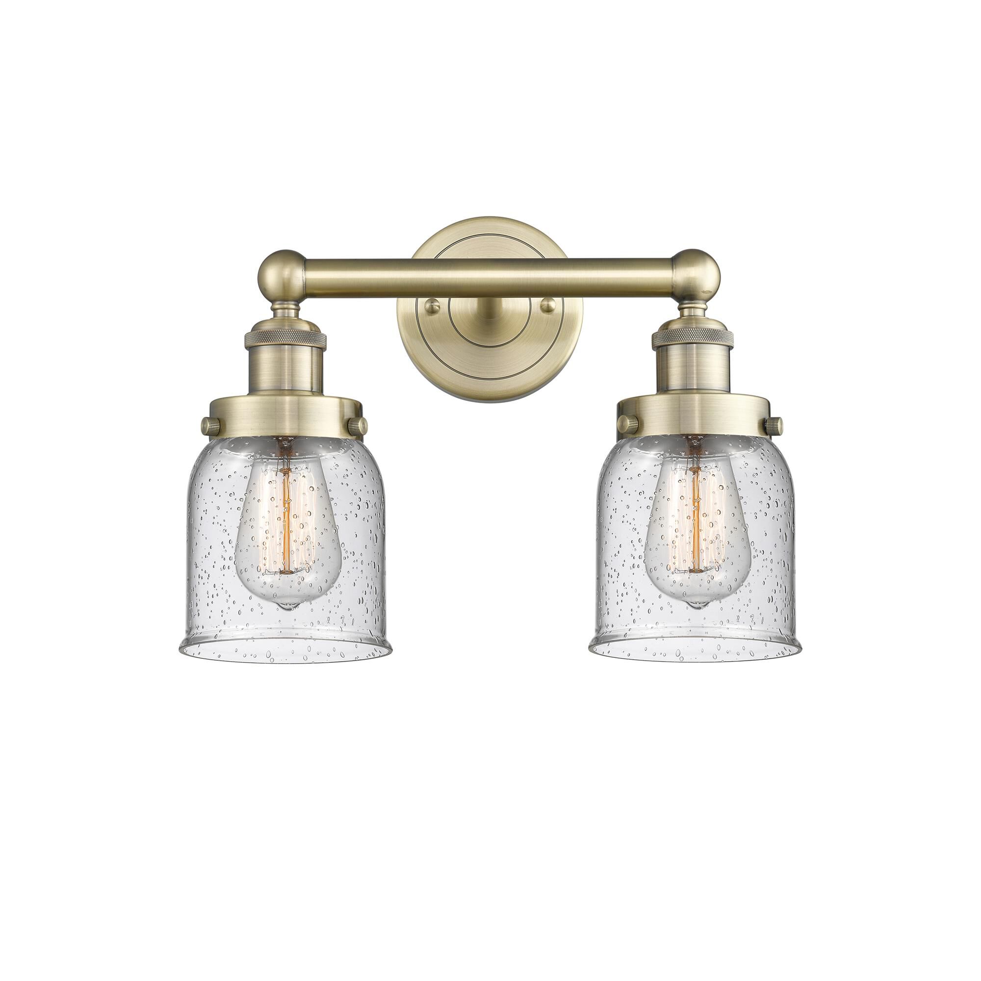 Shown in Antique Brass finish and Seedy glass