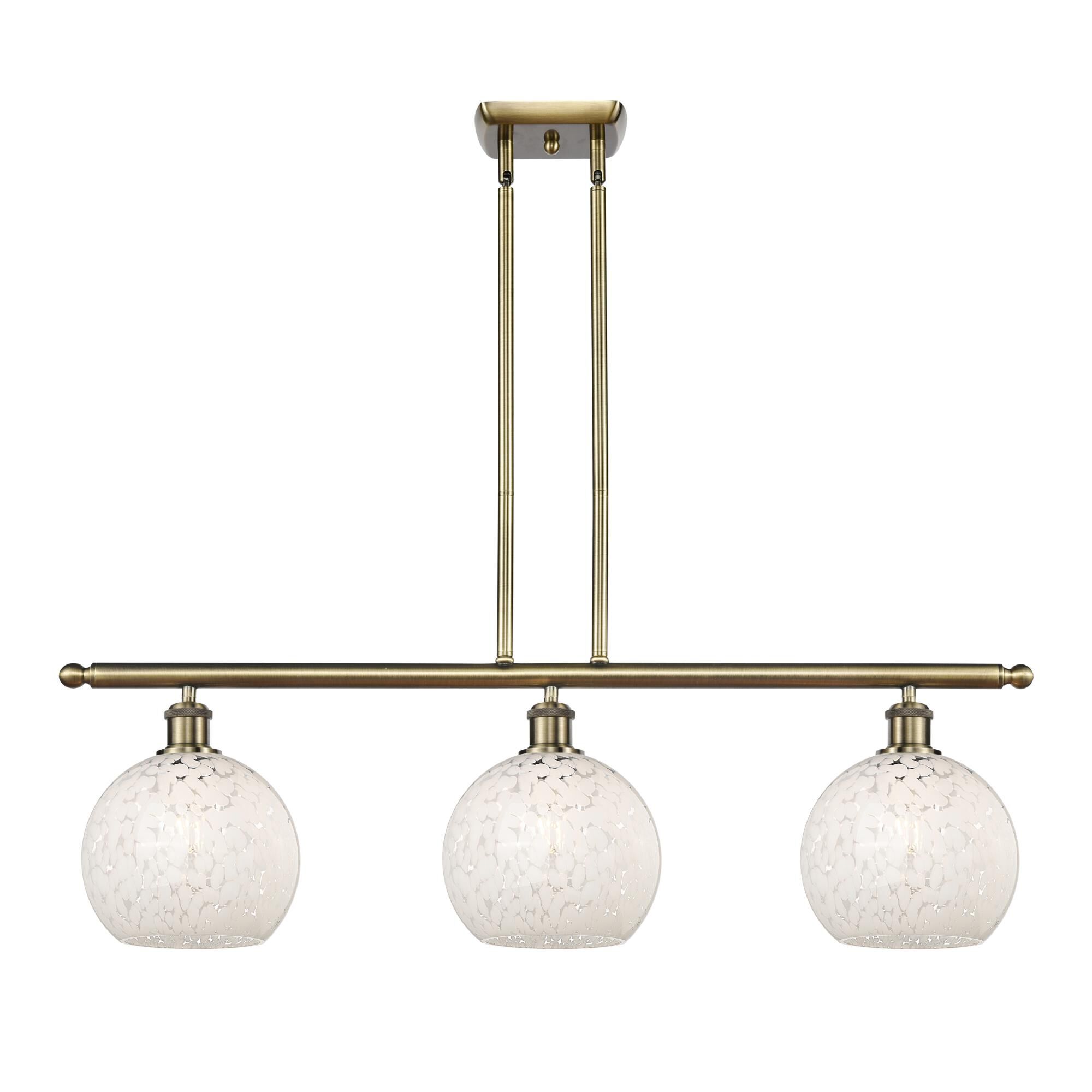 Shown in Antique Brass finish and White Mouchette glass