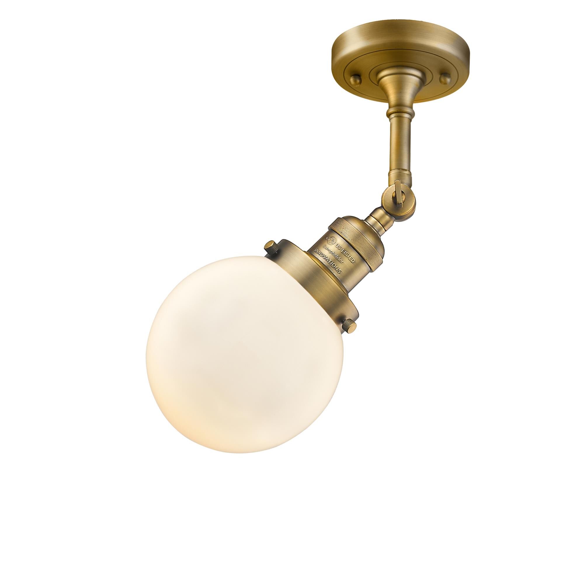 Shown in Brushed Brass finish and Matte White Cased glass and No Accent accent