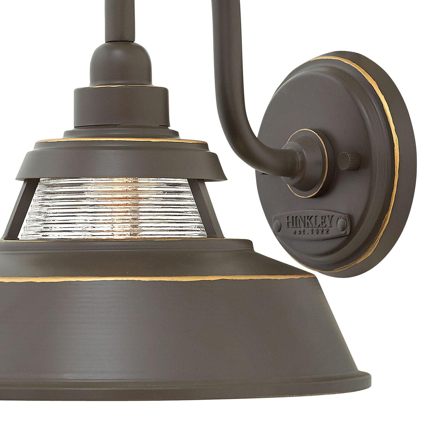 Shown in Oil Rubbed Bronze finish and Ribbed Clear glass