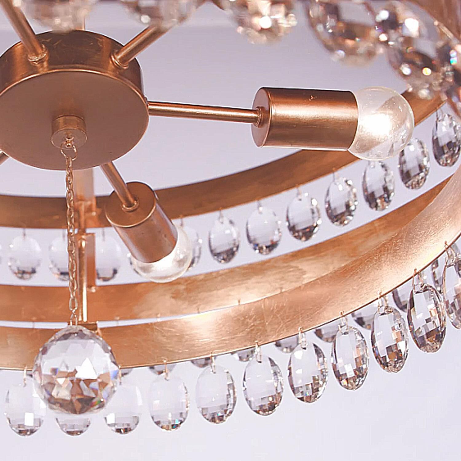 Shown in Antique Gold finish and Clear Elliptical Faceted crystal