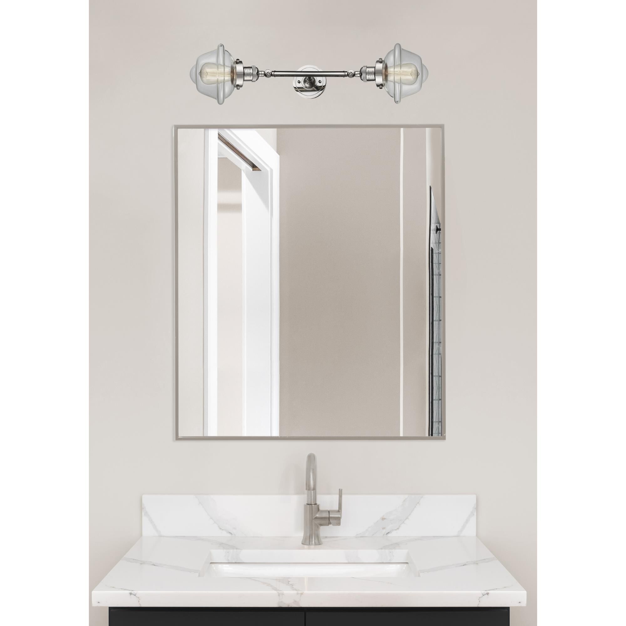 Shown in Polished Nickel finish and Clear glass