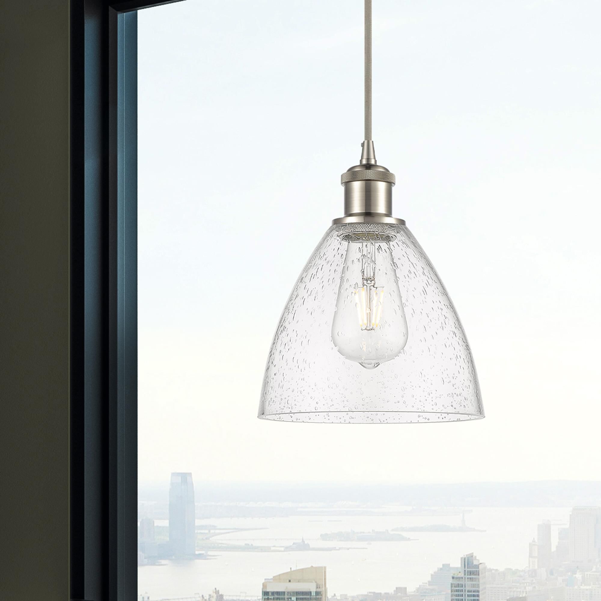 Shown in Brushed Satin Nickel finish and Seedy glass