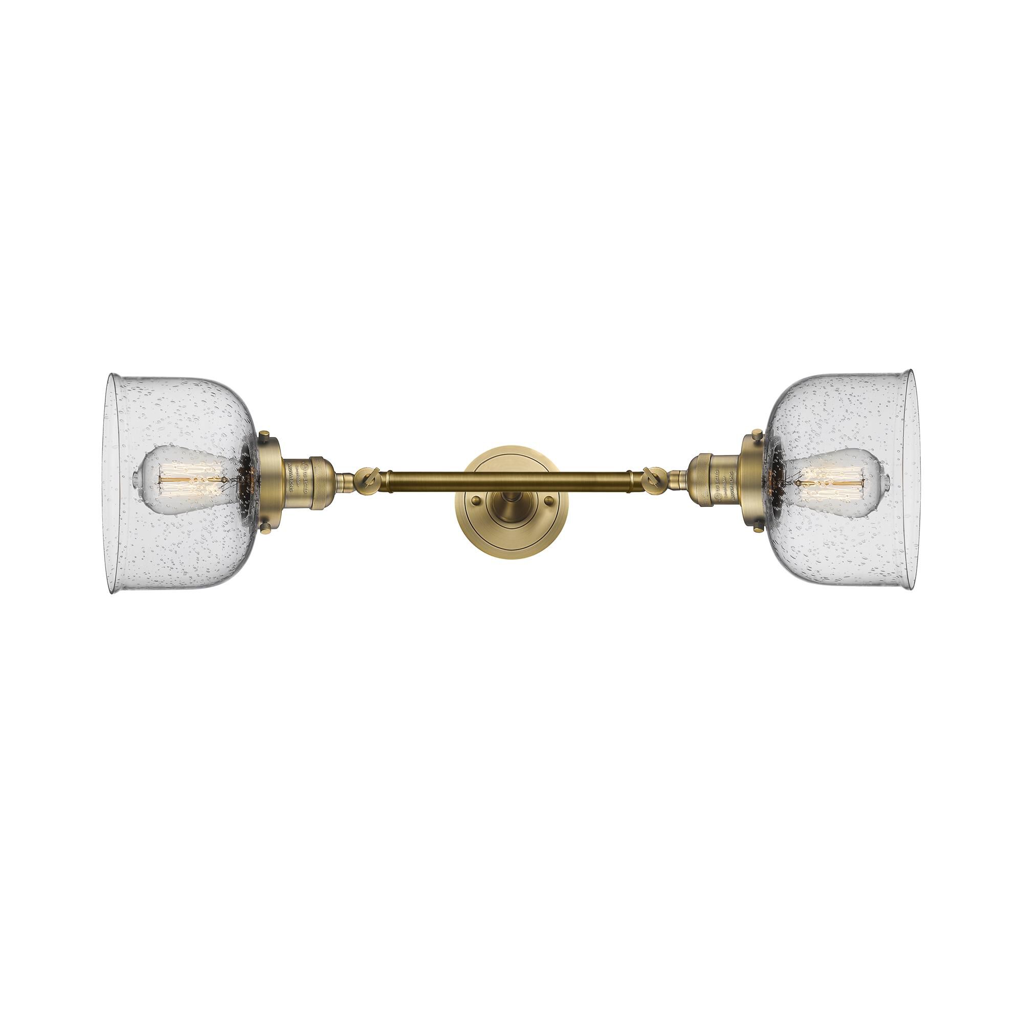 Shown in Brushed Brass finish and Seedy glass
