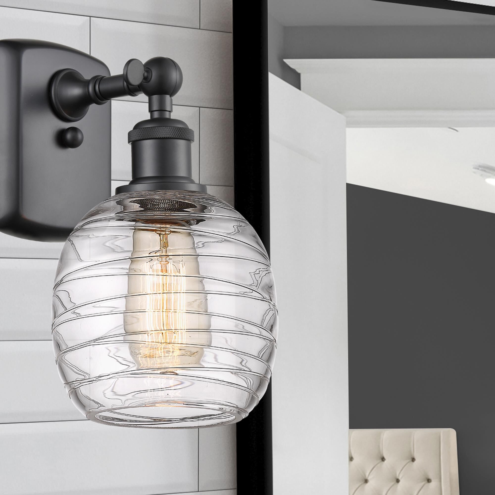 Shown in Matte Black finish and Deco Swirl glass