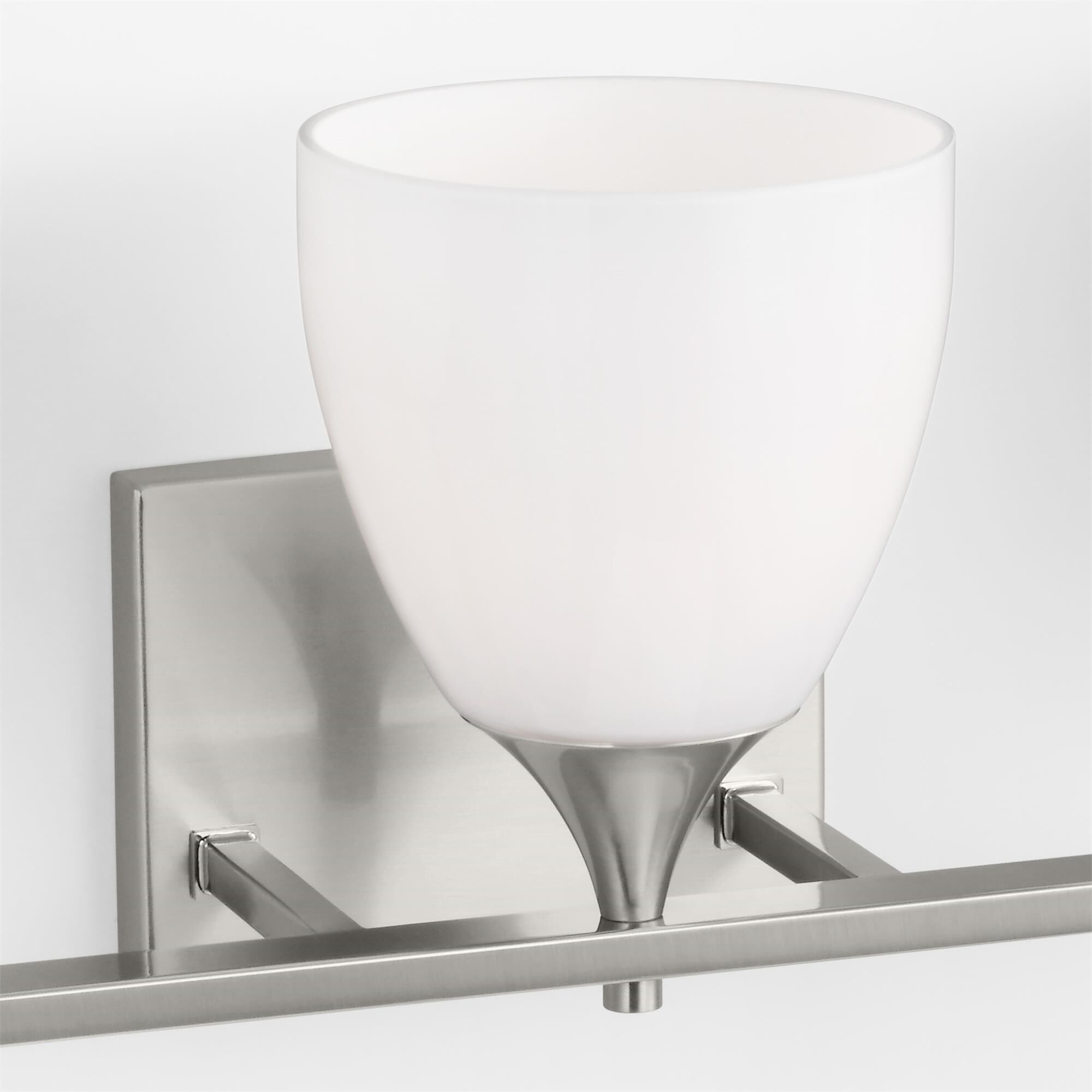 Shown in Brushed Steel finish and Milk Glass s shade