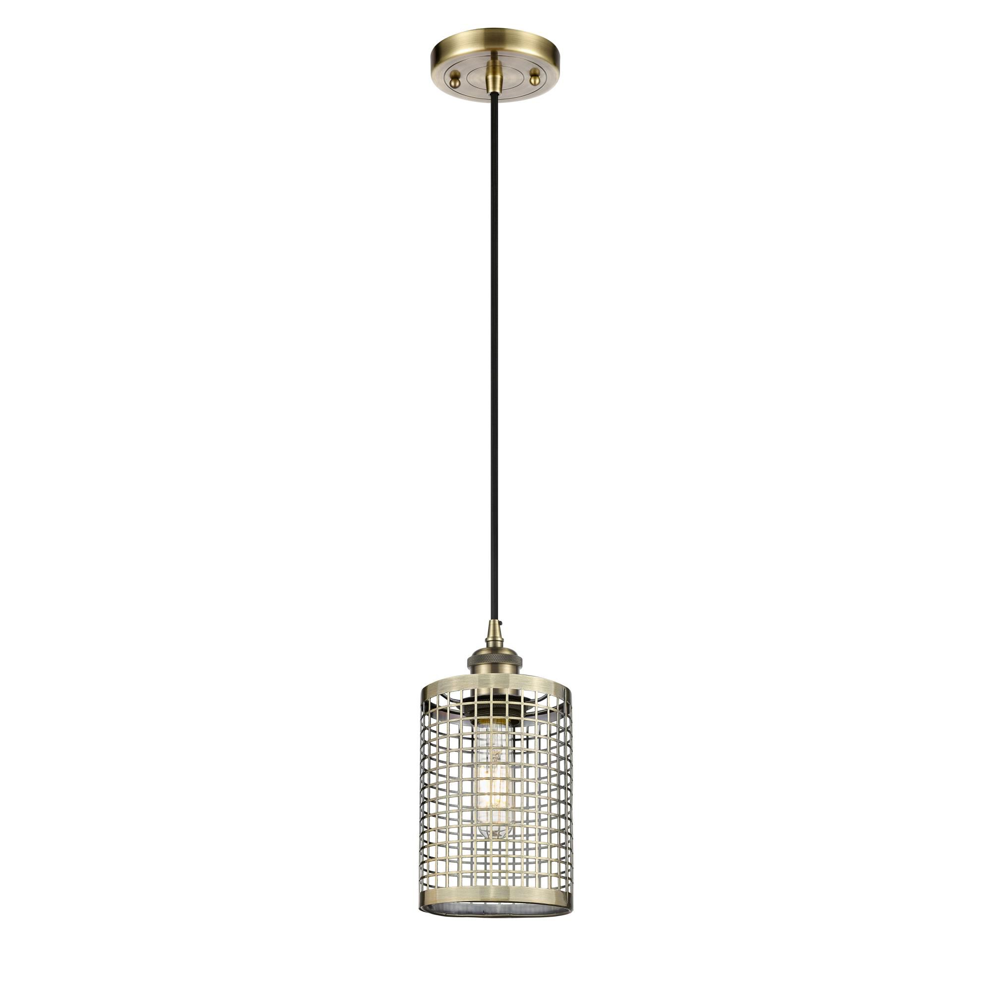 Shown in Antique Brass finish and Antique Brass shade