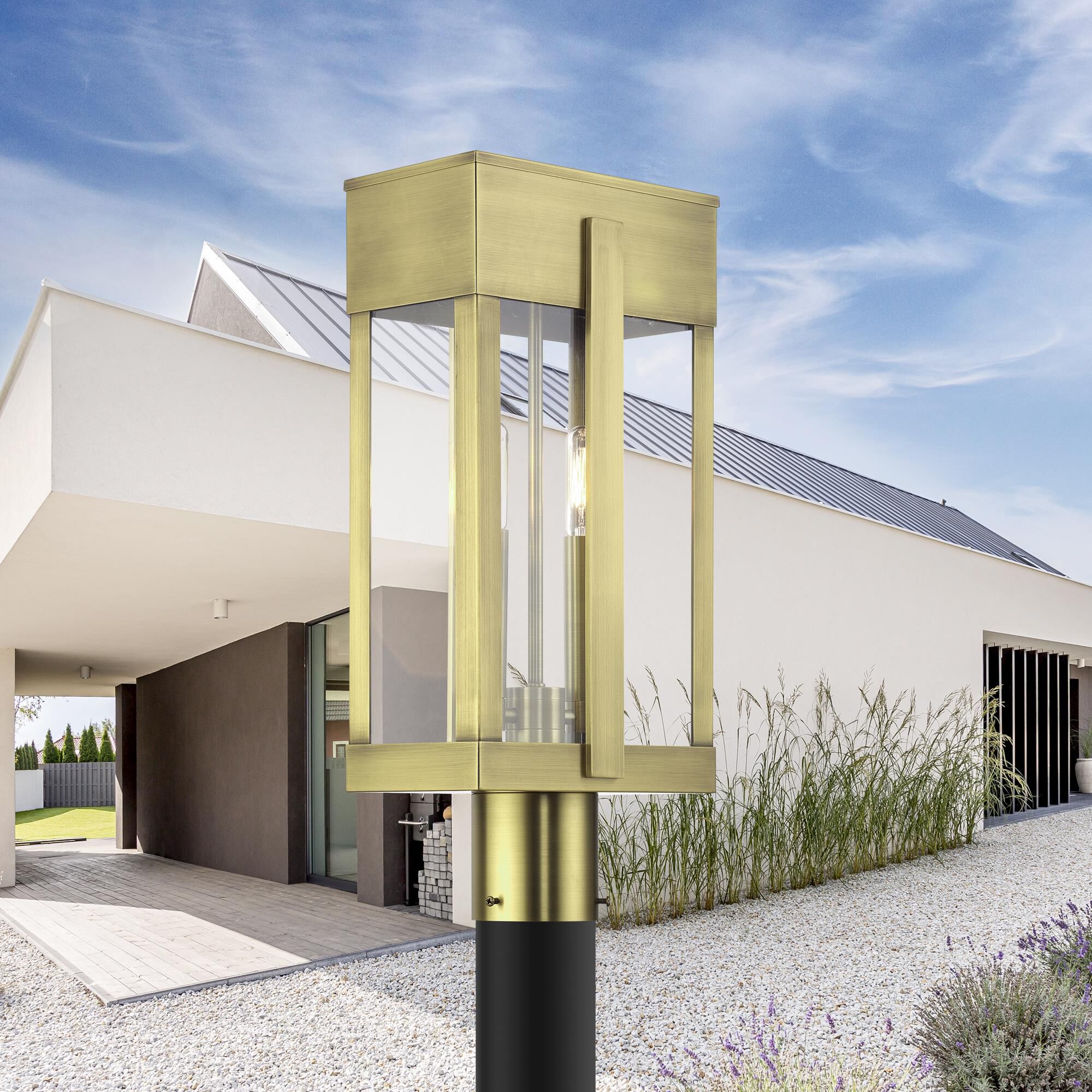 Shown in Antique Brass finish and Clear glass