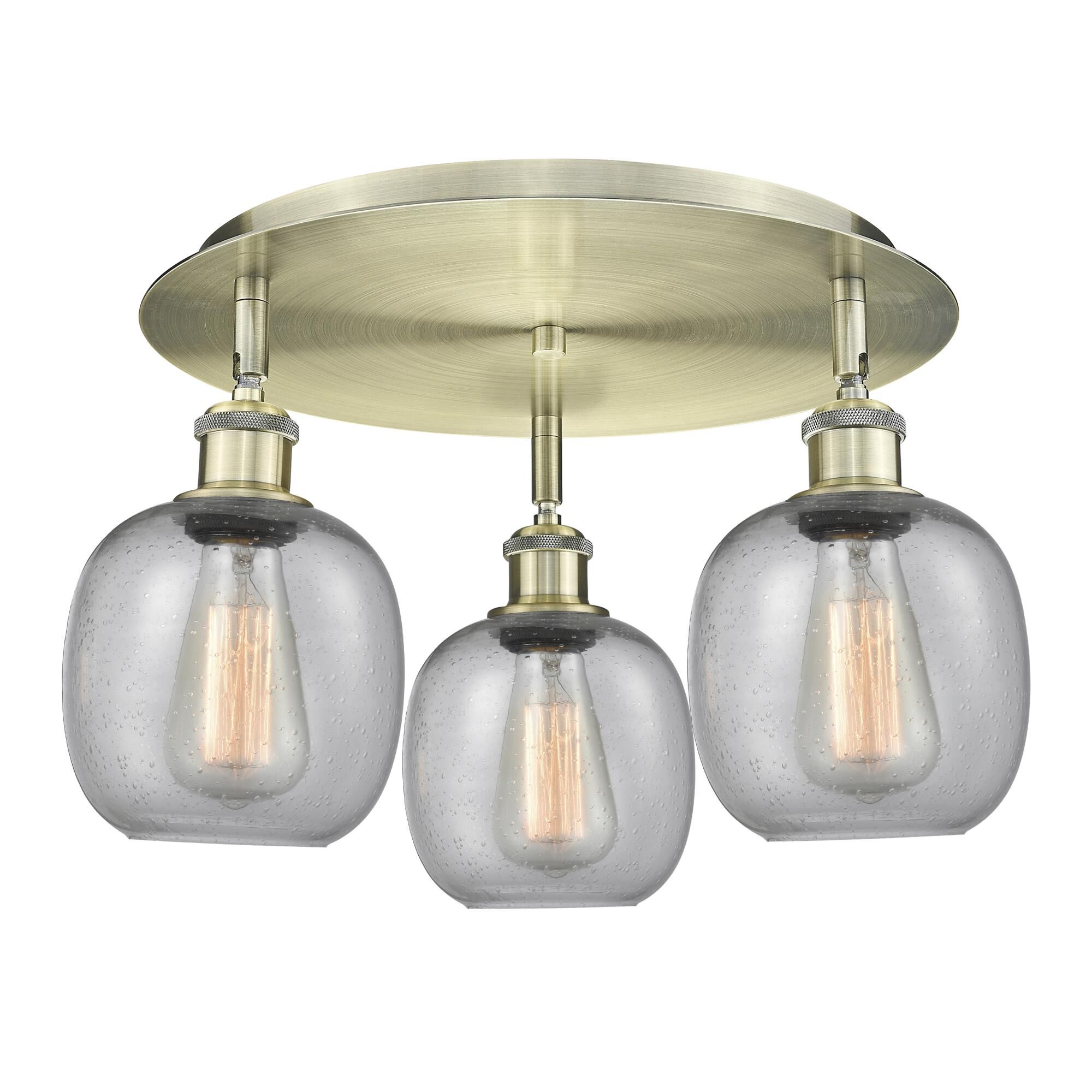 Shown in Antique Brass finish and Seedy glass