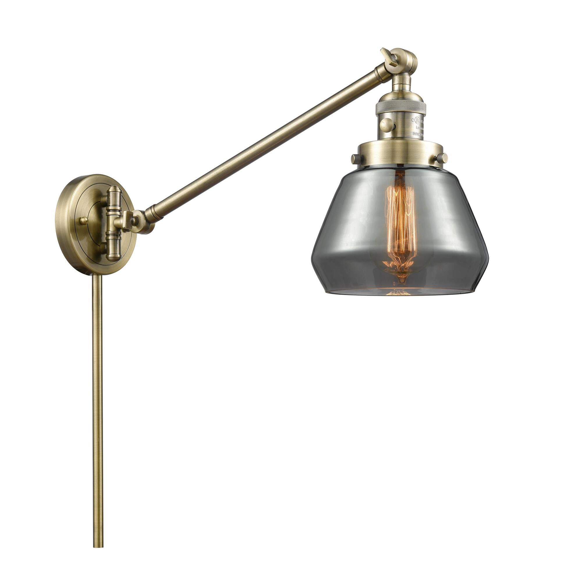 Shown in Antique Brass finish and Plated Smoked glass
