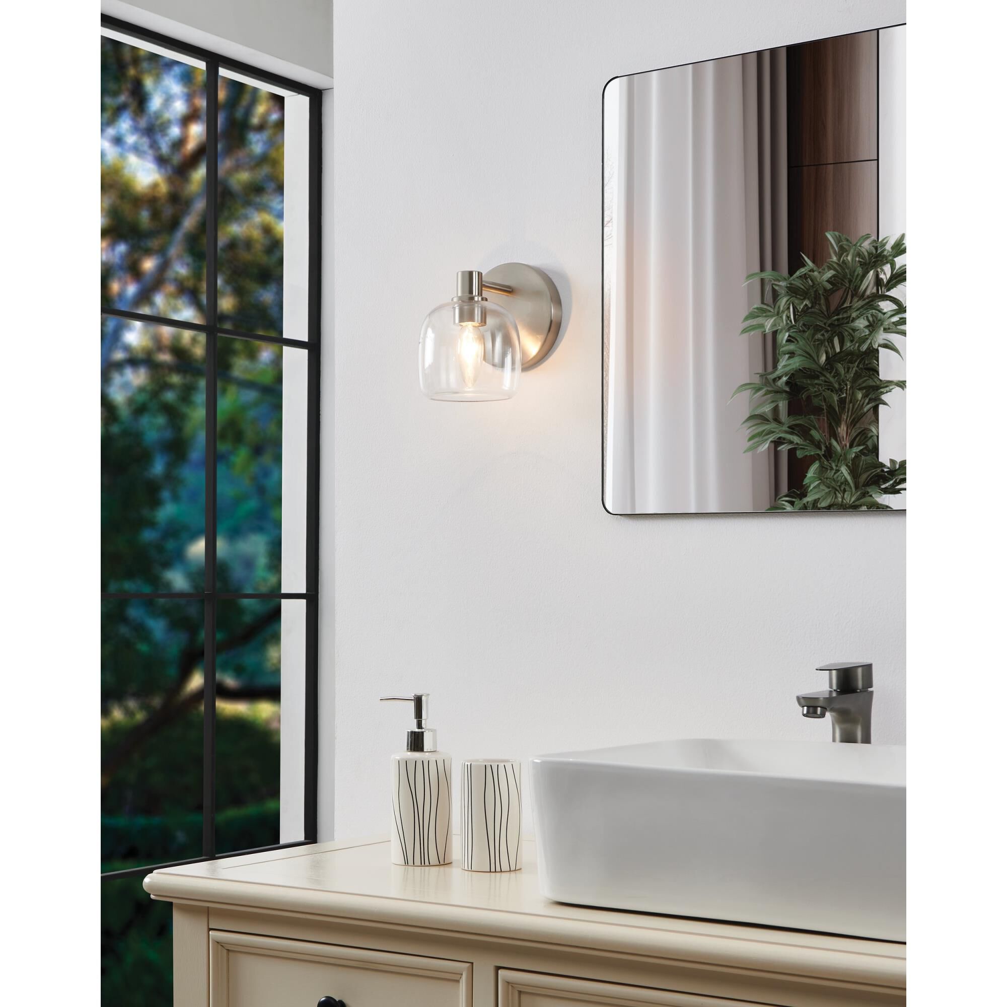 Shown in Brushed Nickel finish and Clear glass