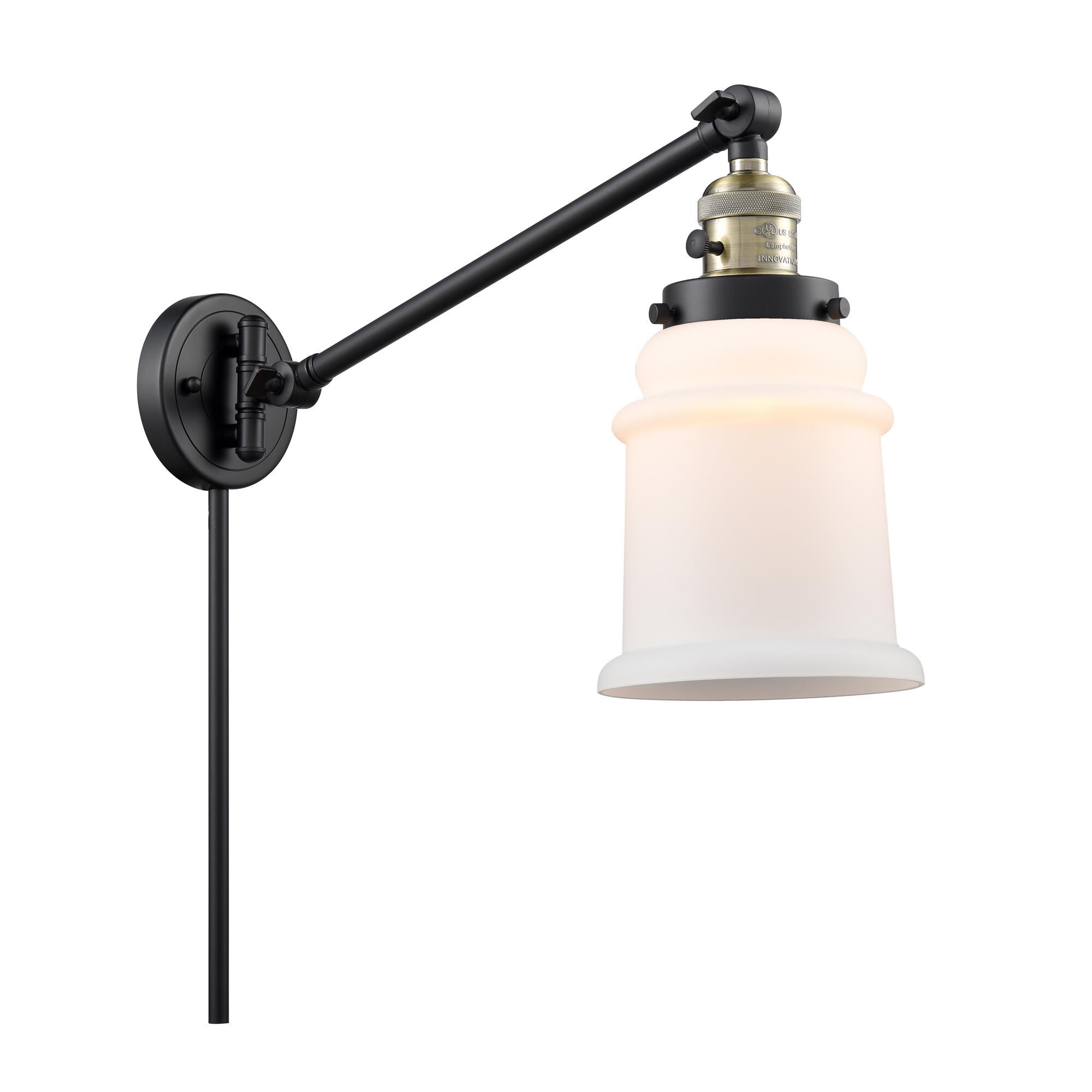 Shown in  Black Antique Brass finish and Matte White - Bell glass