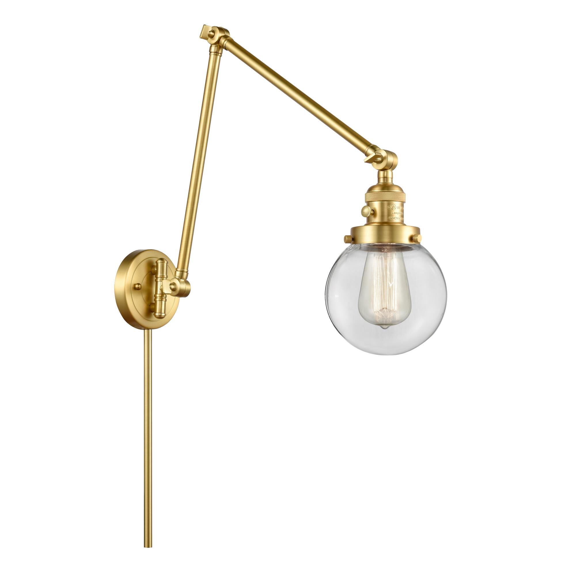 Shown in Satin Gold finish and Clear Beacon glass