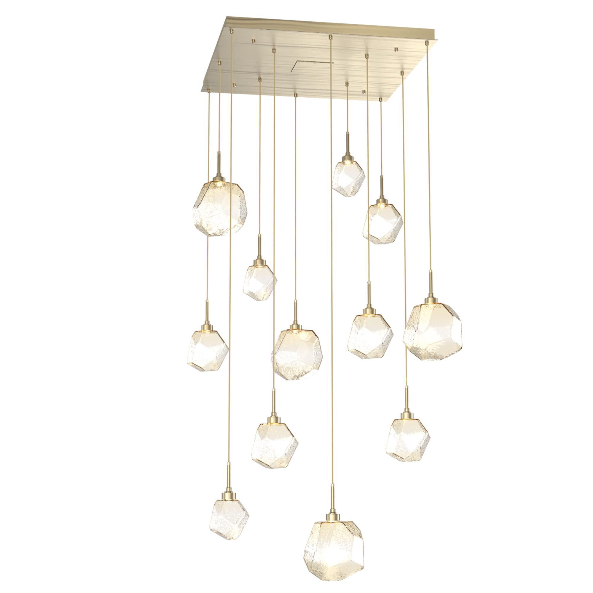 Shown in Novel Brass finish and Amber glass
