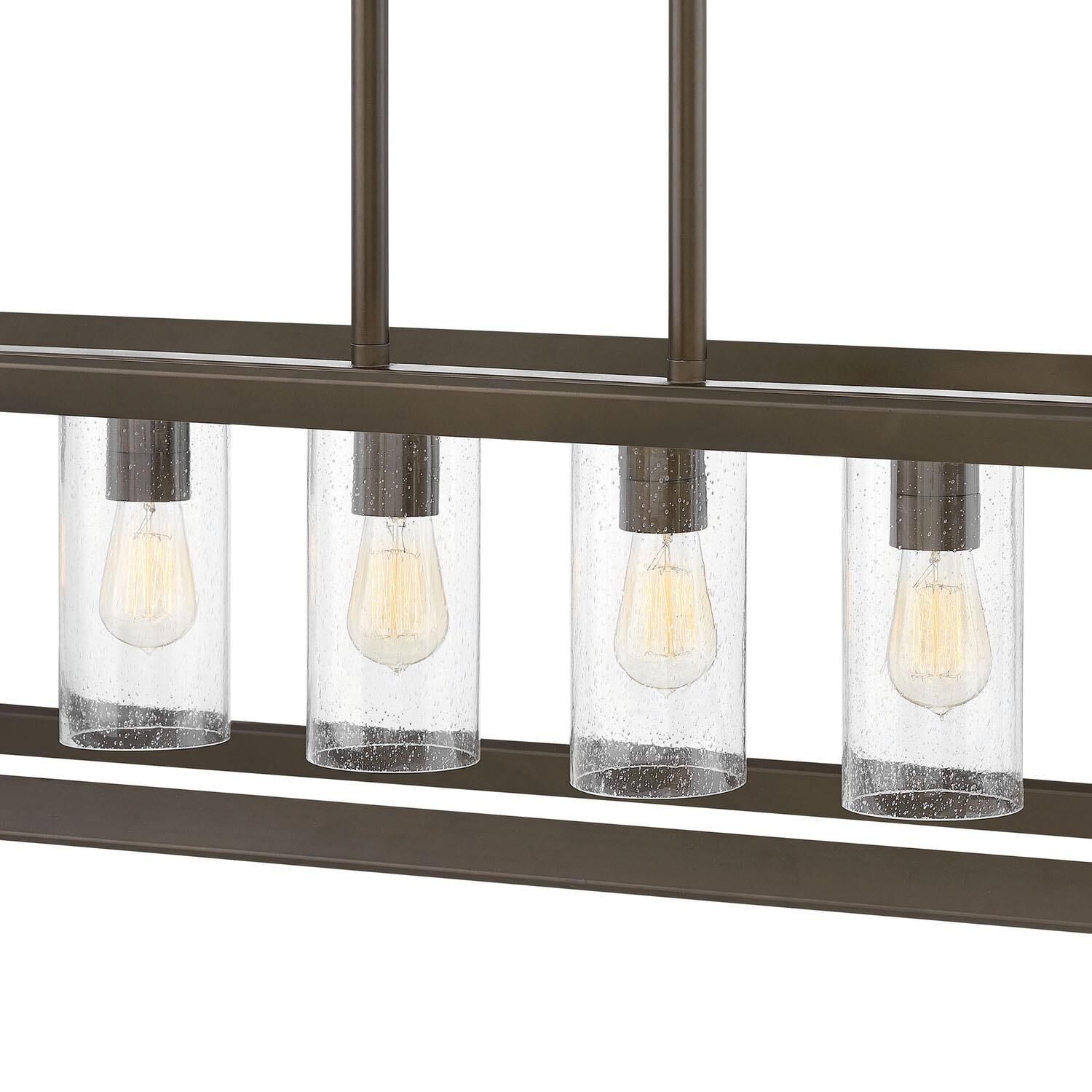 Shown in Warm Bronze finish and Clear Seedy glass