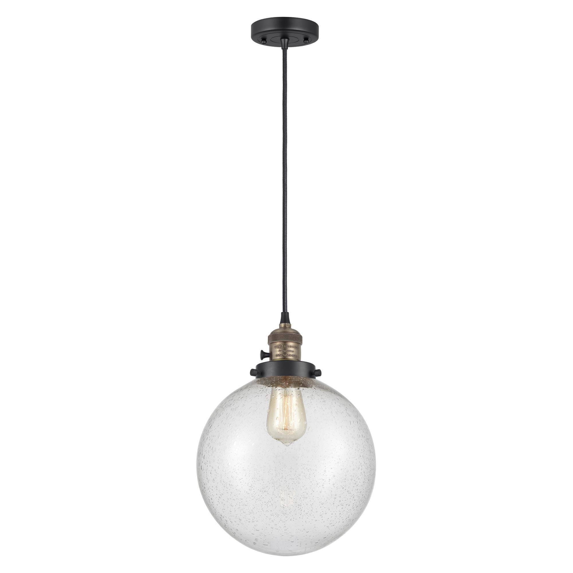 Shown in Black Antique Brass finish and Seedy glass