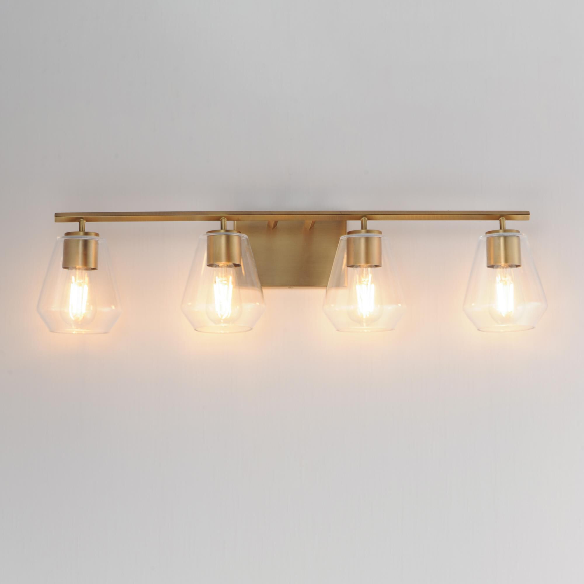 Shown in Natural Aged Brass finish and Clear glass