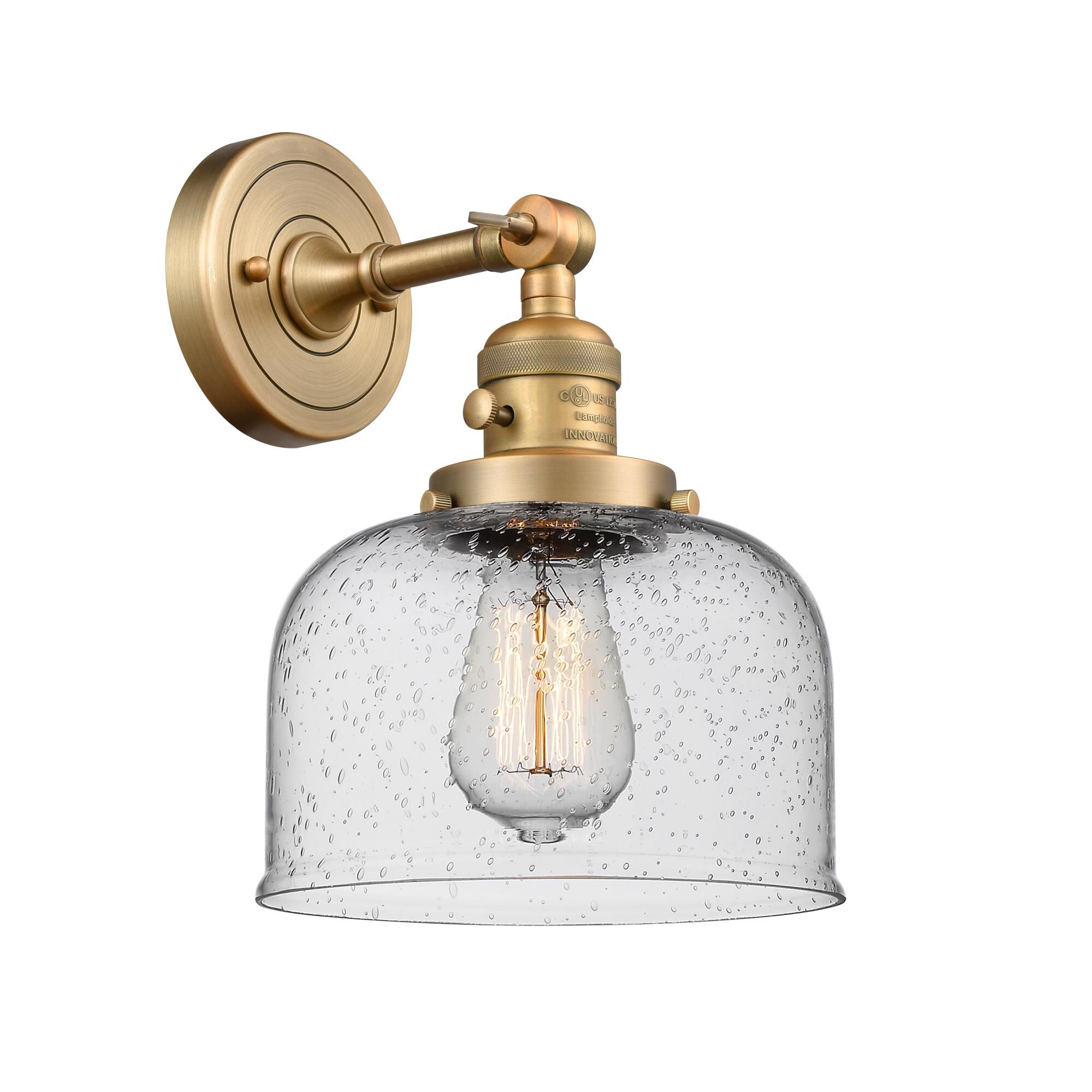 Shown in Brushed Brass finish and Seedy Large Bell glass and Switch on Socket accent