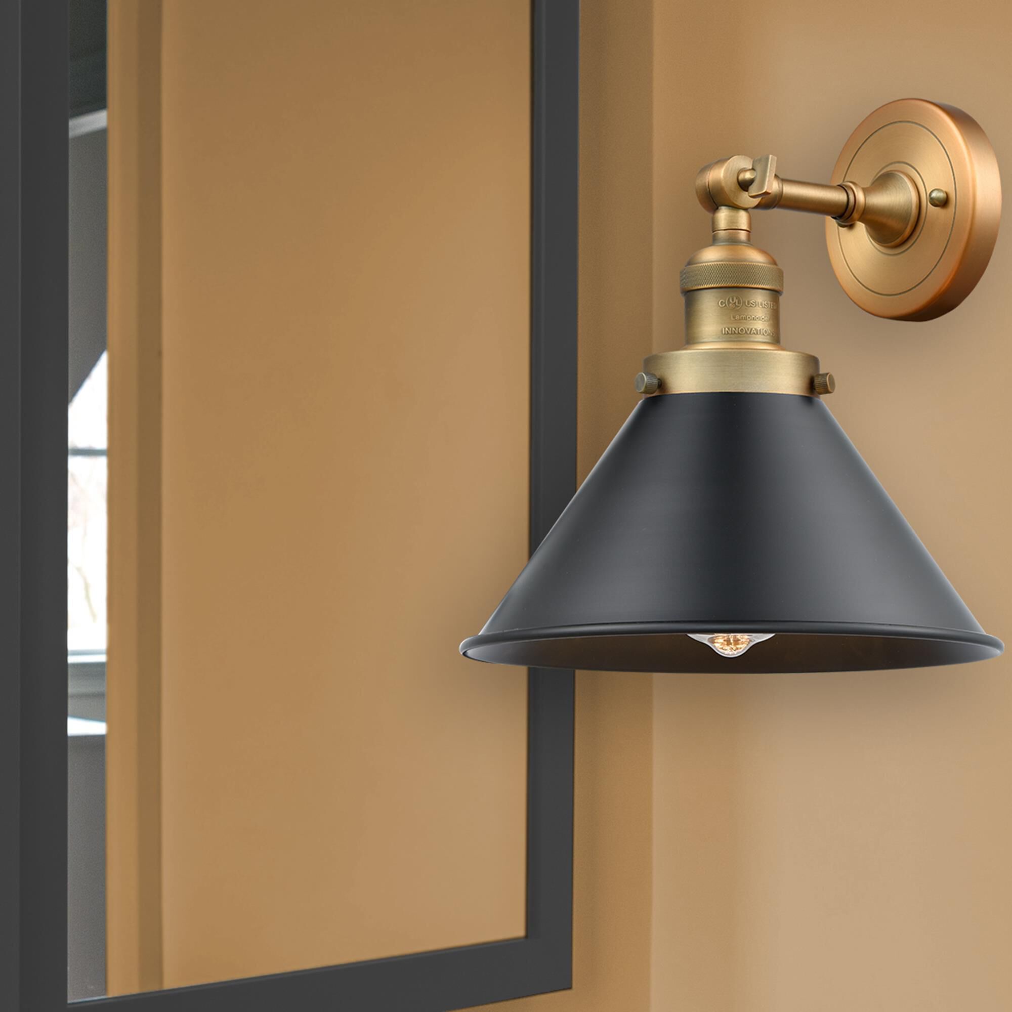Shown in Brushed Brass finish and Brushed Brass Briarcliff shade