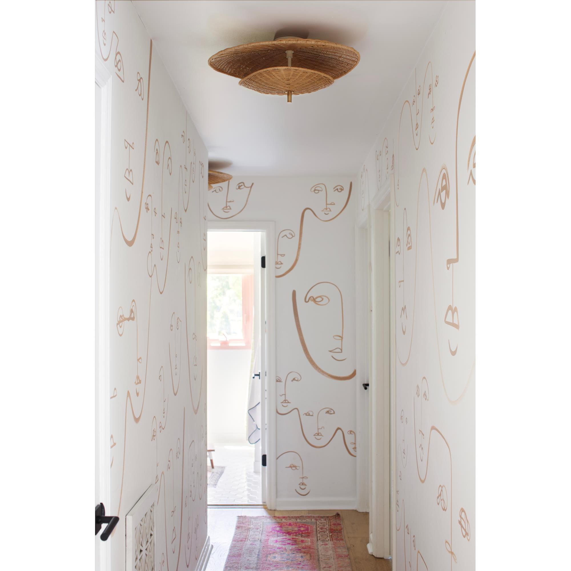 Shown in Aged Brass finish and Natural Woven shade