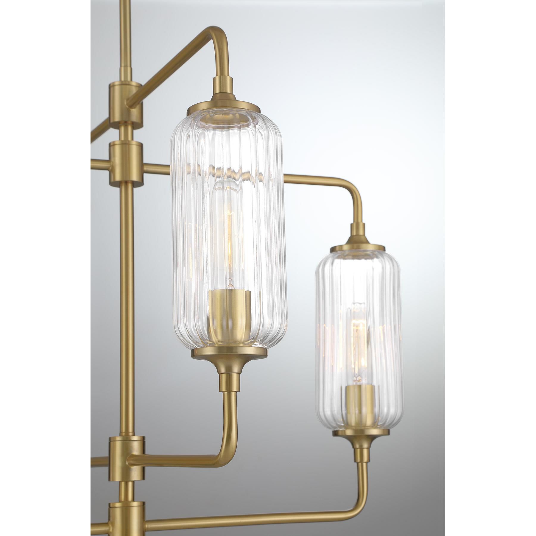 Shown in Warm Brass finish and Clear Ribbed glass