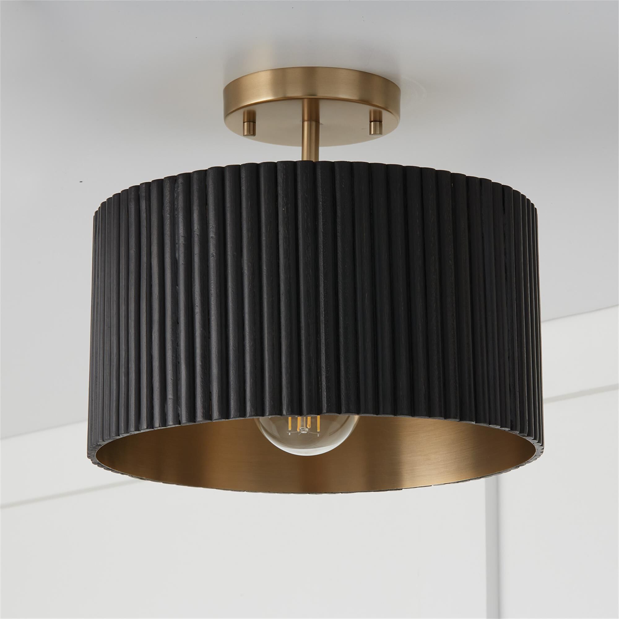 Shown in Black Stain And Matte Brass finish