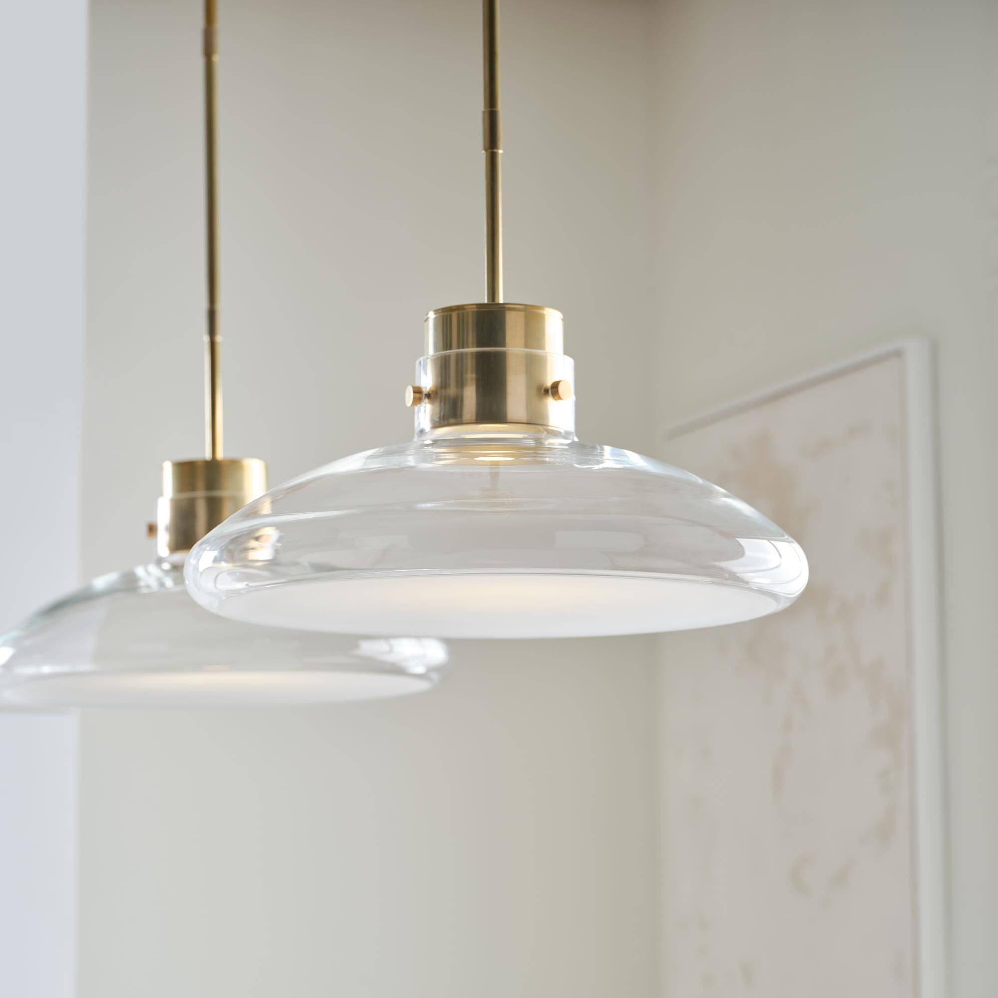 Shown in Hand-Rubbed Antique Brass finish and Clear glass