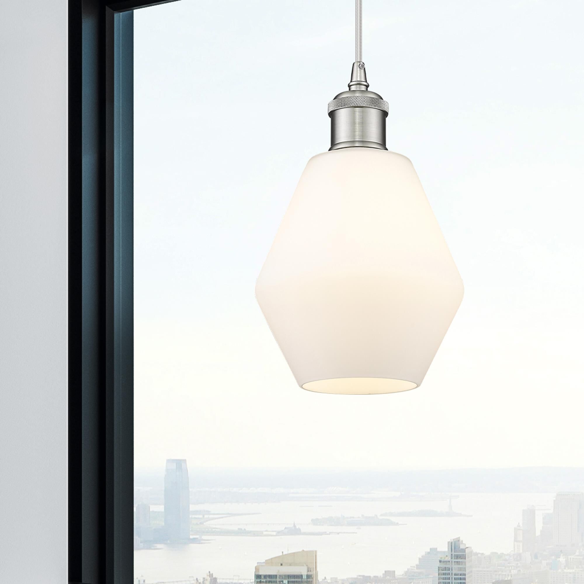 Shown in Brushed Satin Nickel finish and Matte White glass