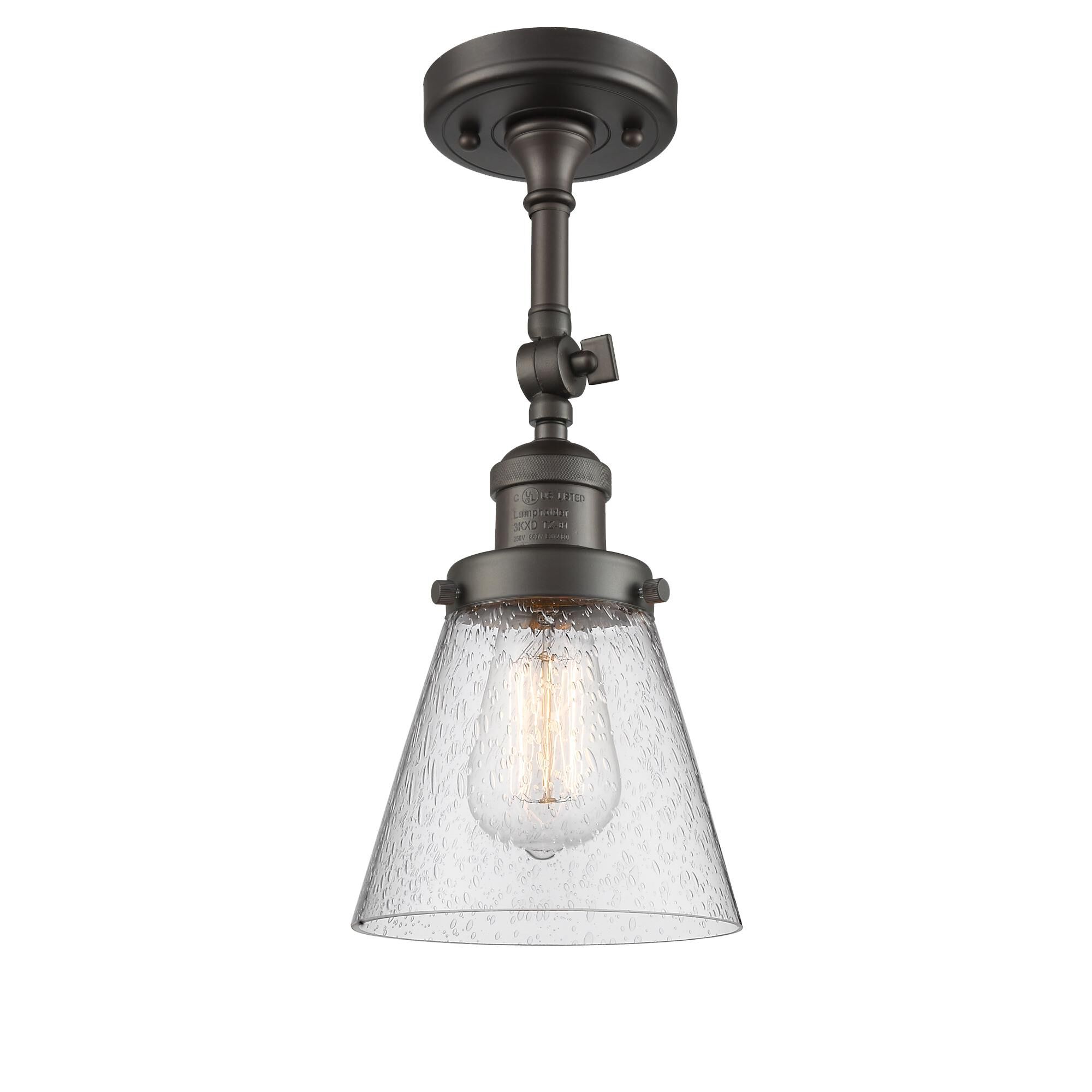 Shown in Oil Rubbed Bronze finish and Seedy glass and None accent