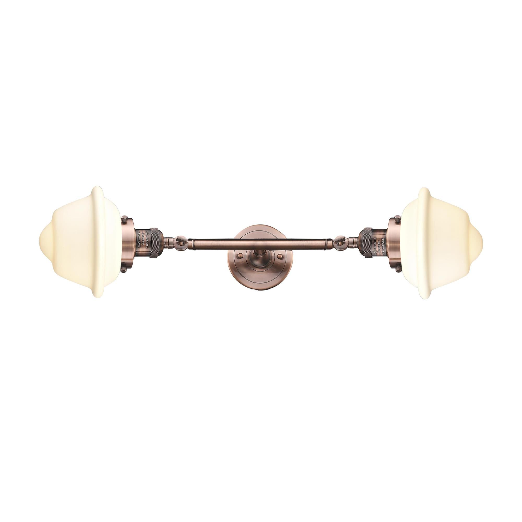Shown in Antique Copper finish and Matte White Cased glass