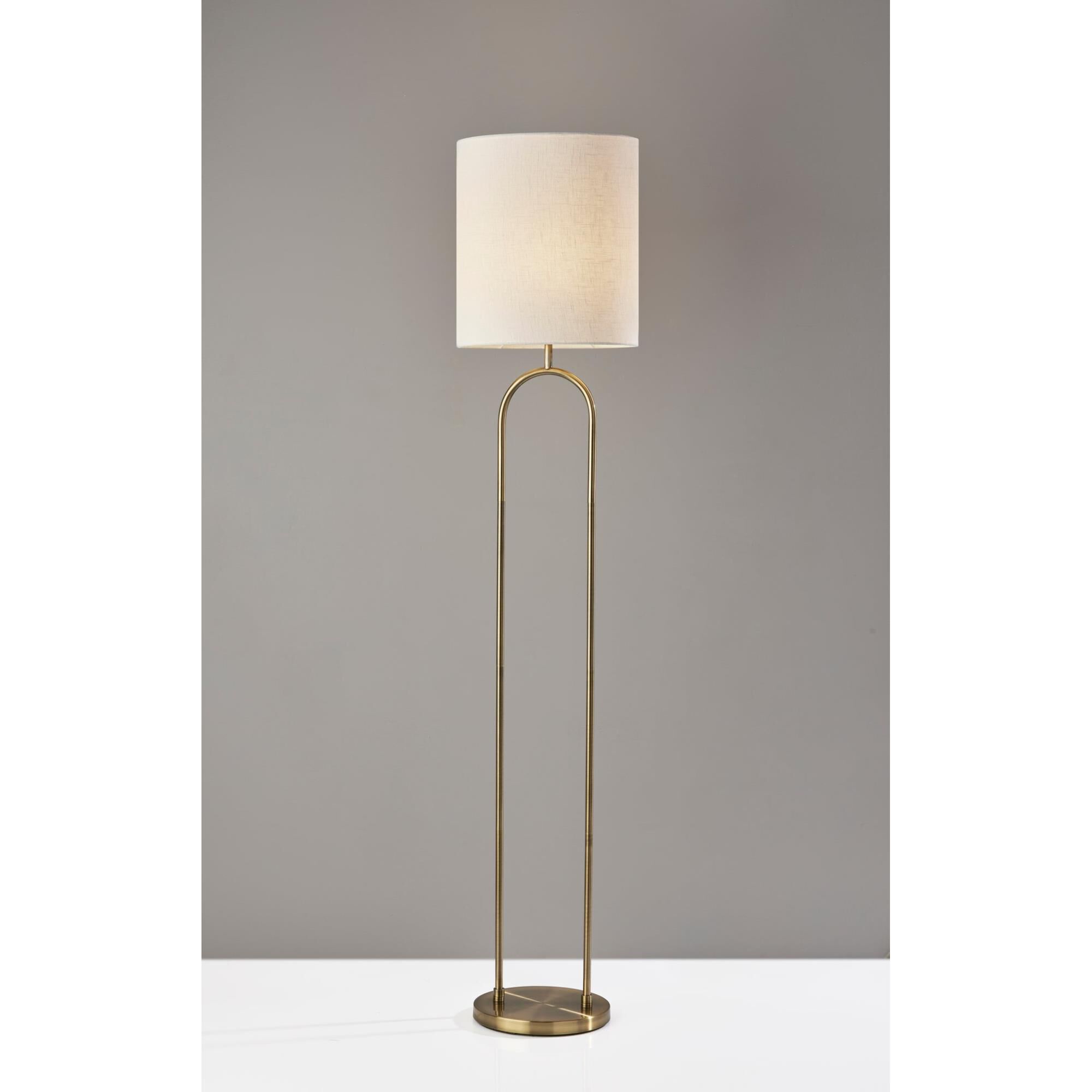 Shown in Antique Brass finish and Off-White Textured Fabric shade