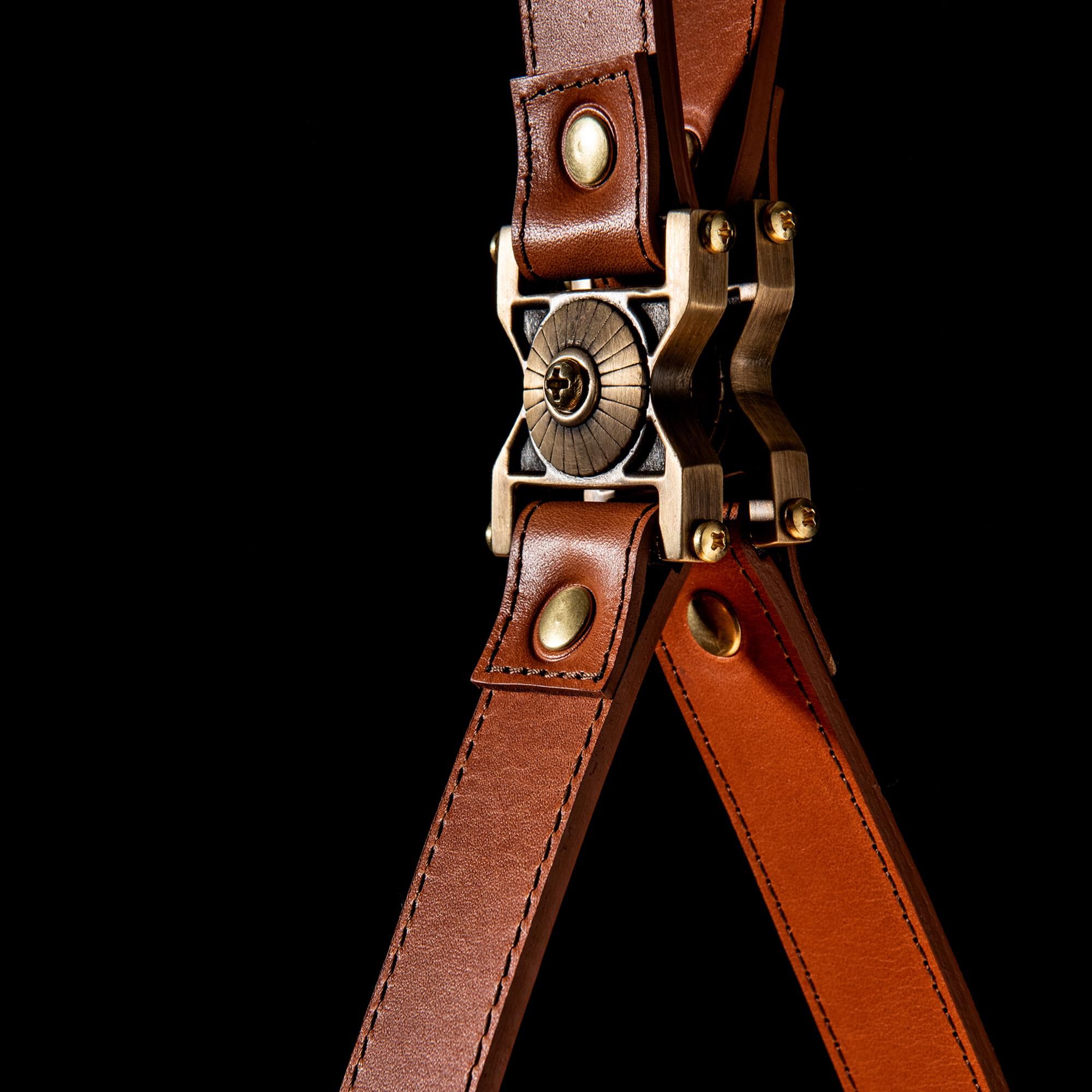 Shown in Brass with Black finish and Opal glass and Leather Chestnut accent